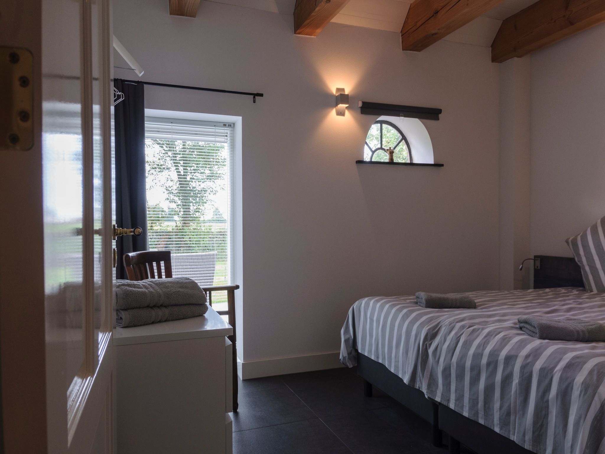 Een slaapkamer van Groepsaccomodatie - Balkenhoeve in Schagen