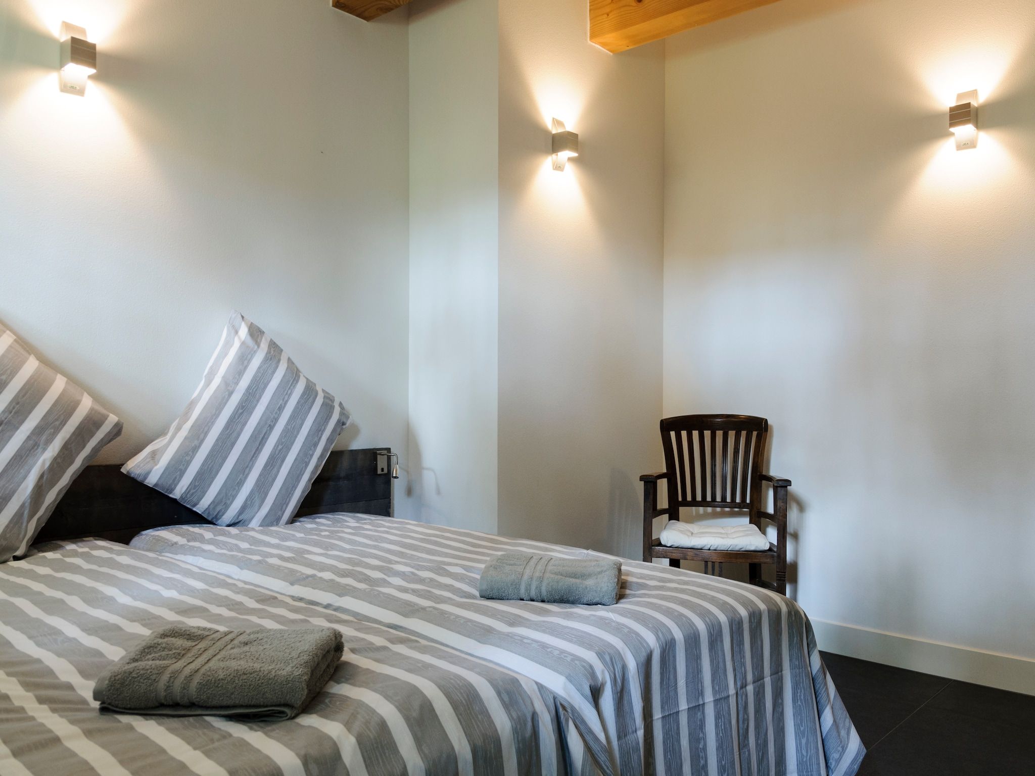 Een slaapkamer van Groepsaccomodatie - Balkenhoeve in Schagen