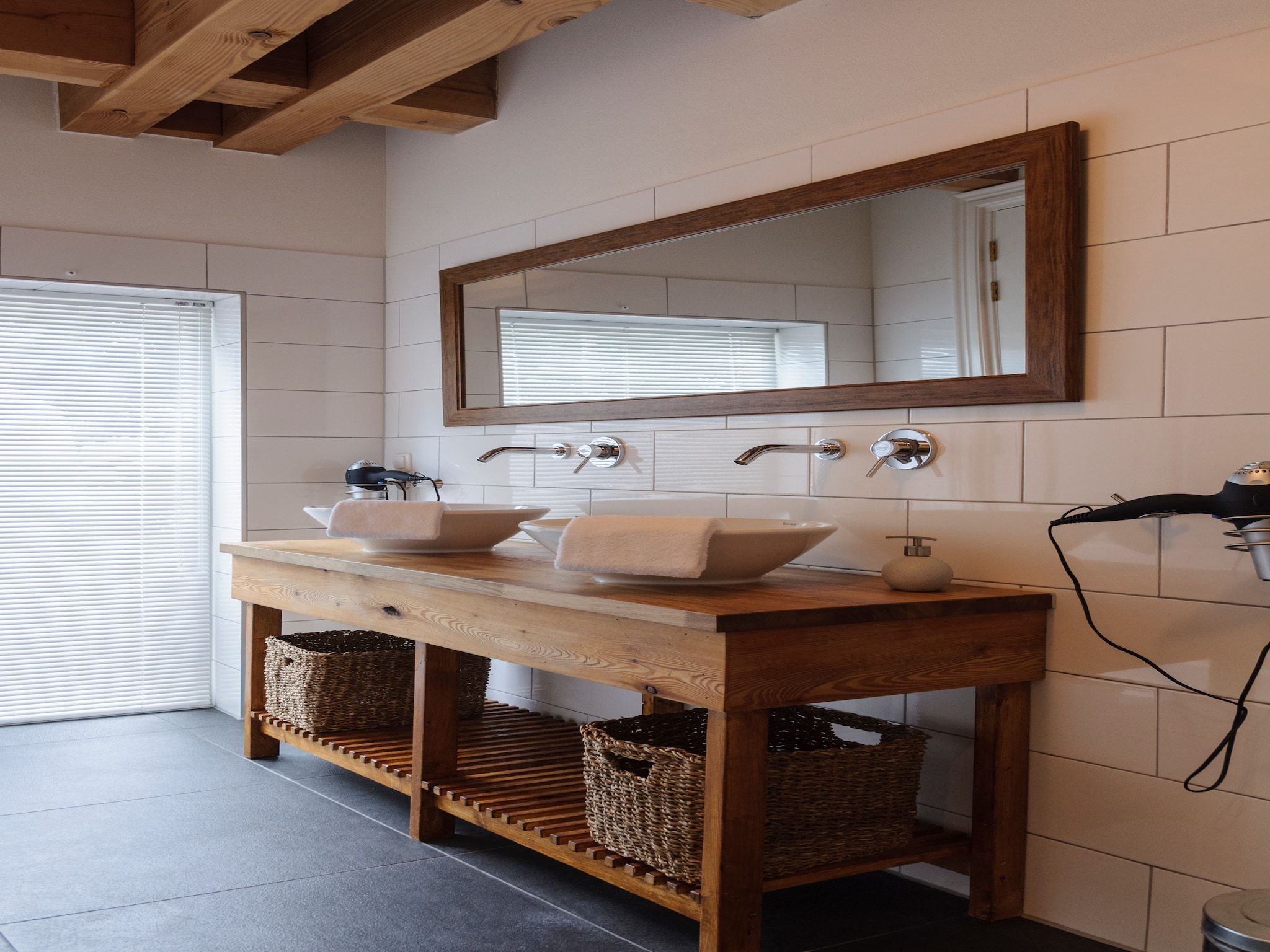 De badkamer van Groepsaccomodatie - Balkenhoeve in Schagen