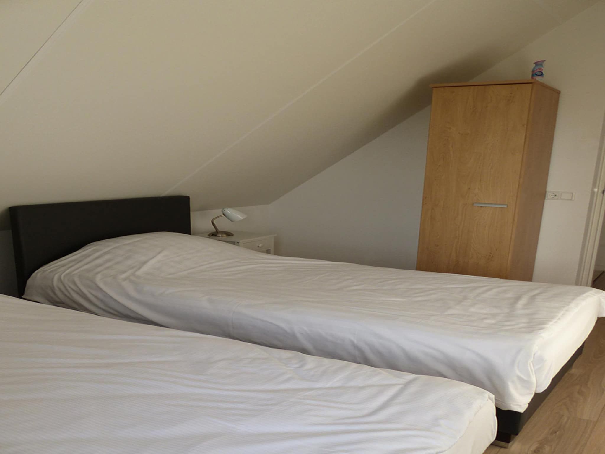 Een slaapkamer van Villa de Hertog 722 in Baarle-nassau