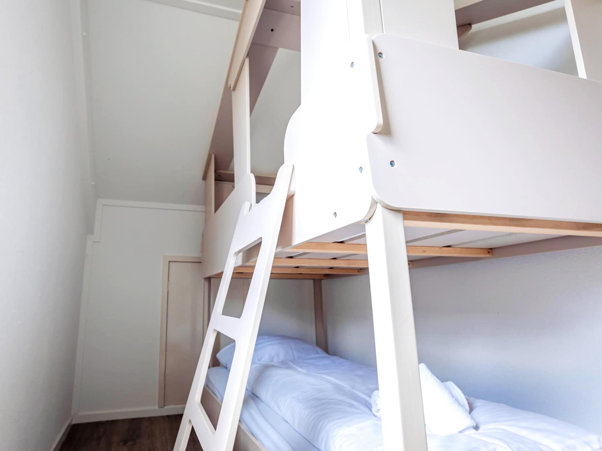 Een slaapkamer van 8 - Persons Family bungalow in Ewijk