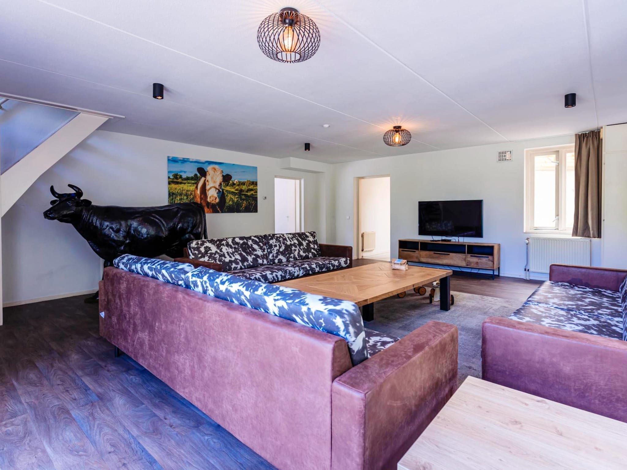 De woonkamer van 16 - Persons Family bungalow in Ewijk