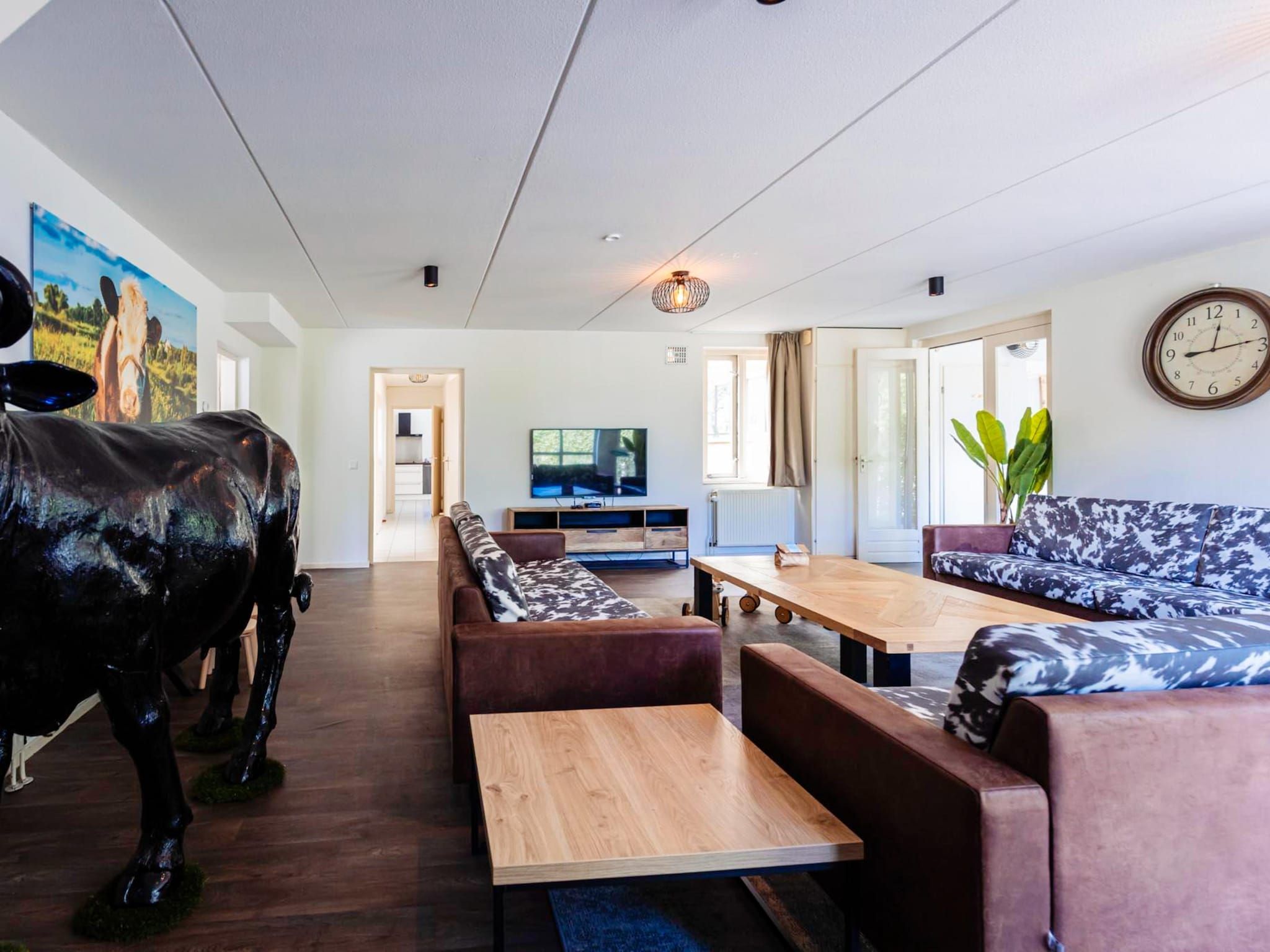 De woonkamer van 16 - Persons Family bungalow in Ewijk