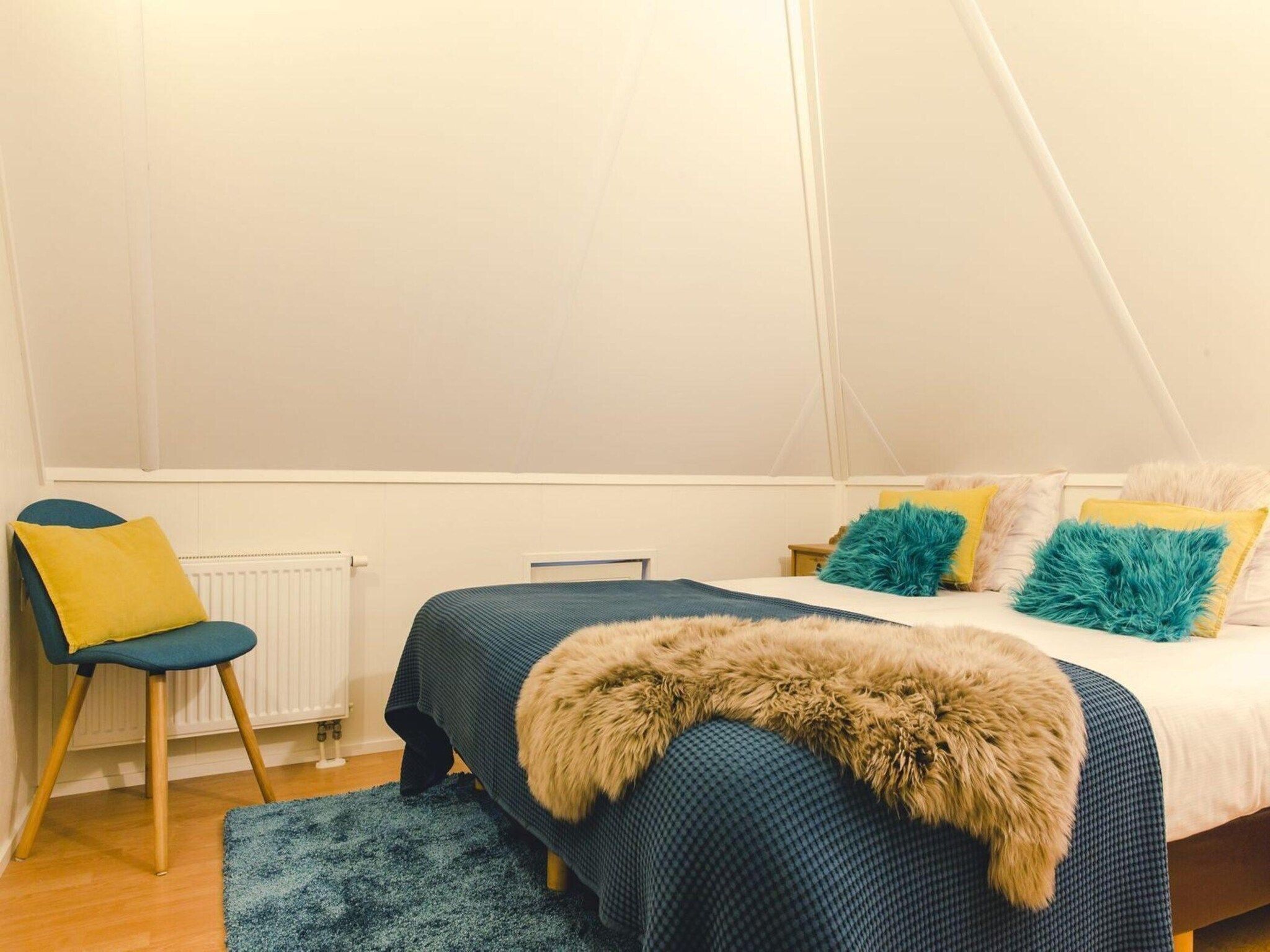 Een slaapkamer van Group accommodation (2x Reggehooiberg, with large backyard) I 10 people in Zuna