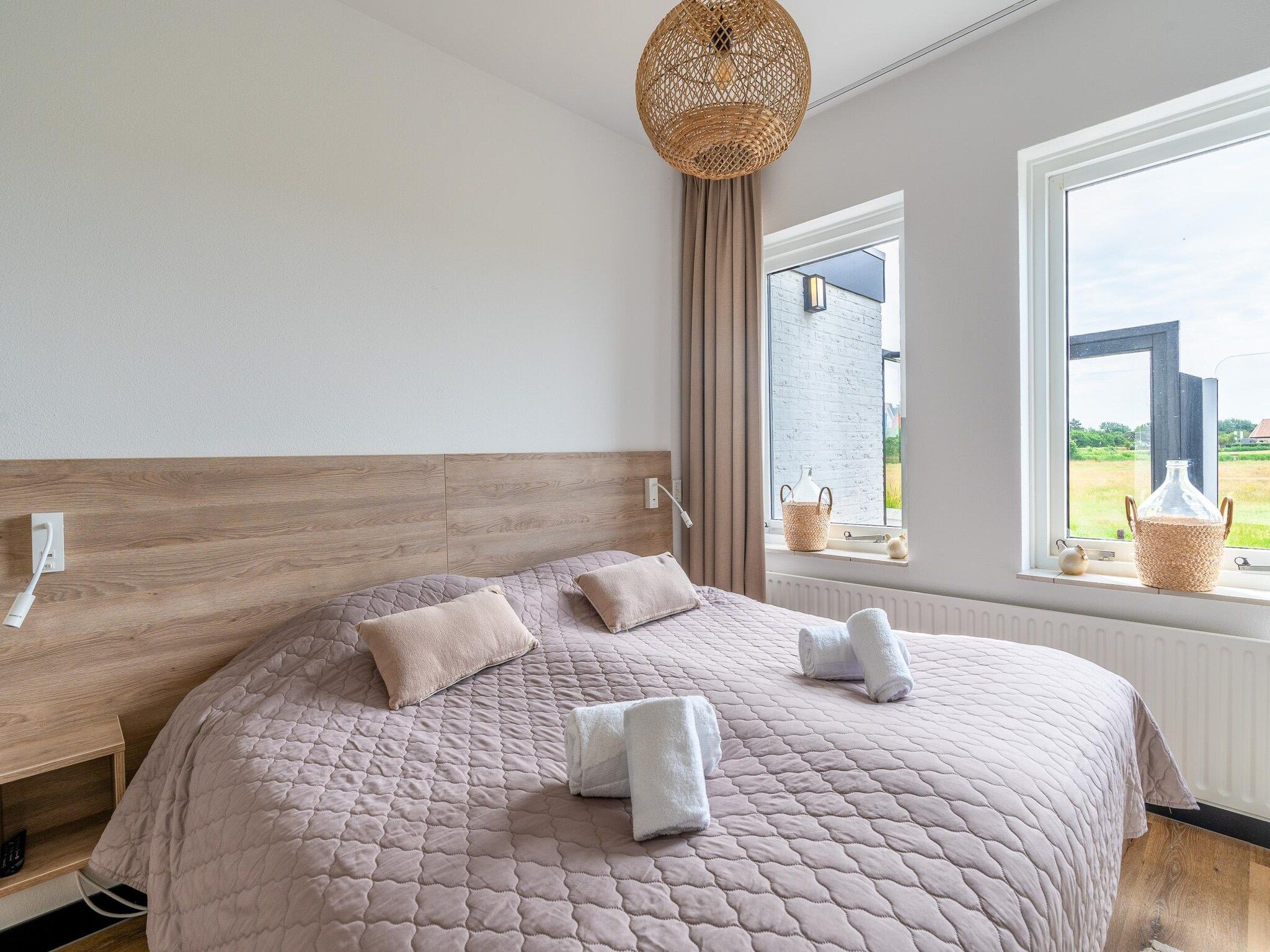 Een slaapkamer van Orchismient 17 in De Koog