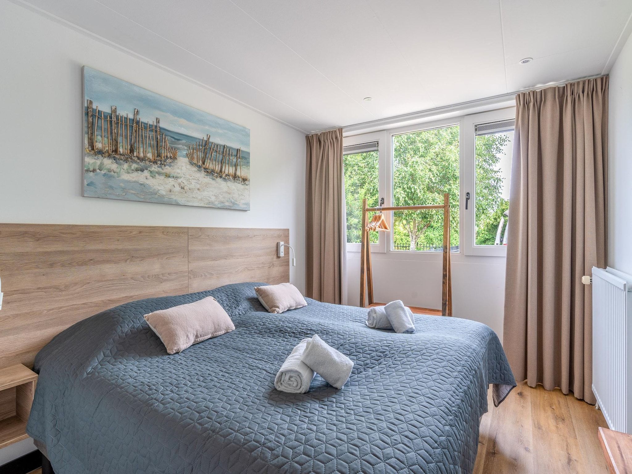 Een slaapkamer van Orchismient 17 in De Koog