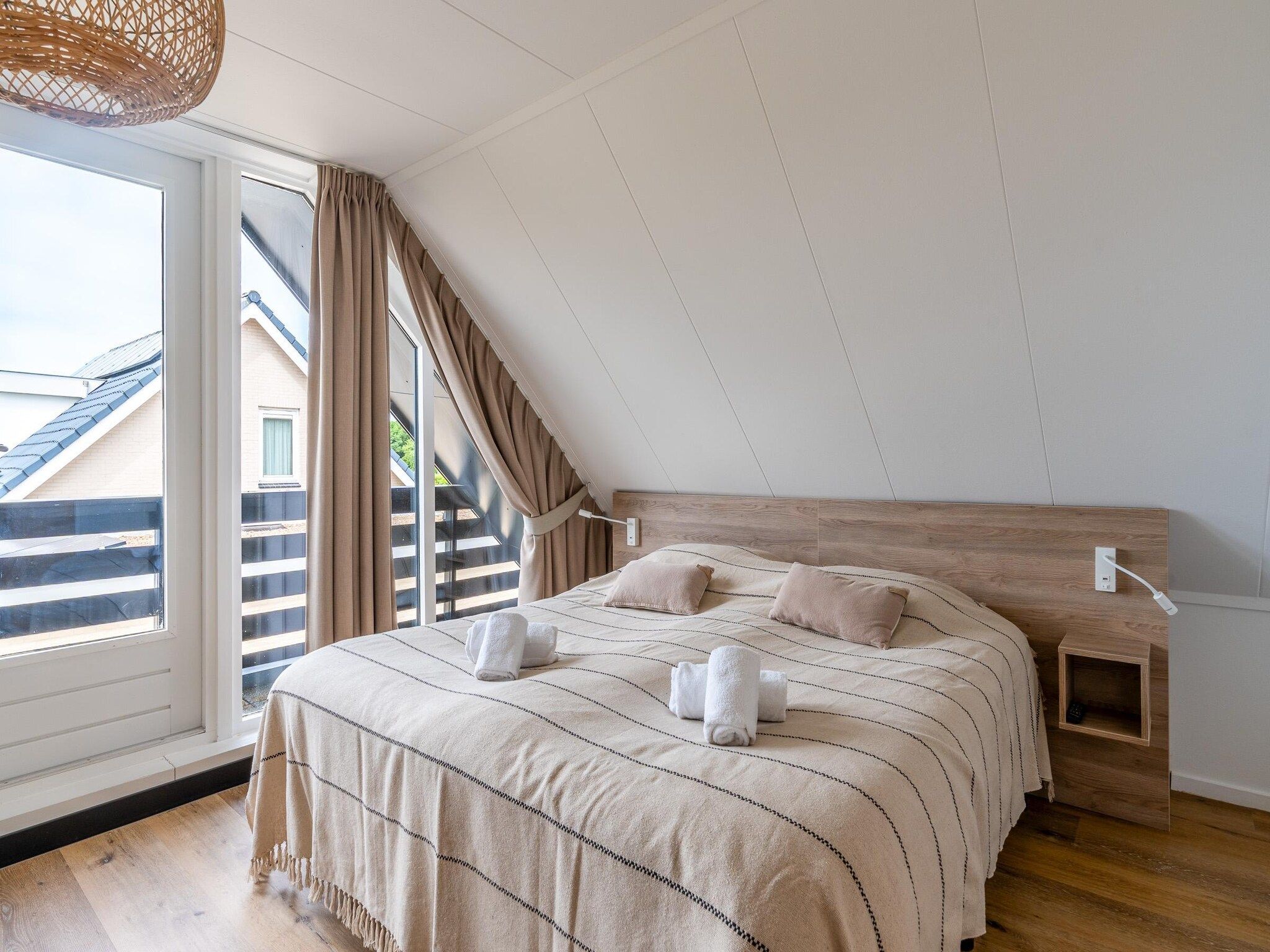 Een slaapkamer van Orchismient 17 in De Koog