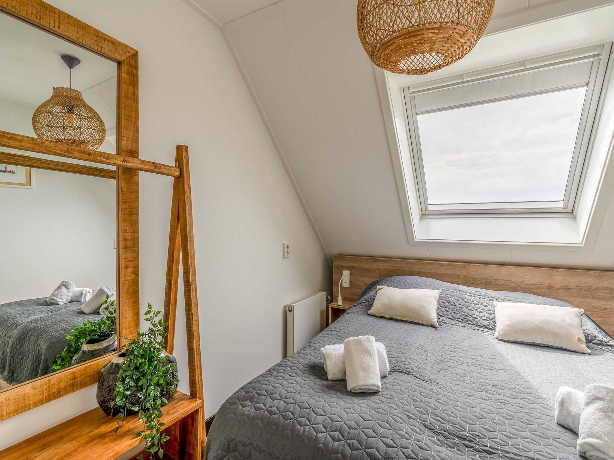 Een slaapkamer van Orchismient 17 in De Koog