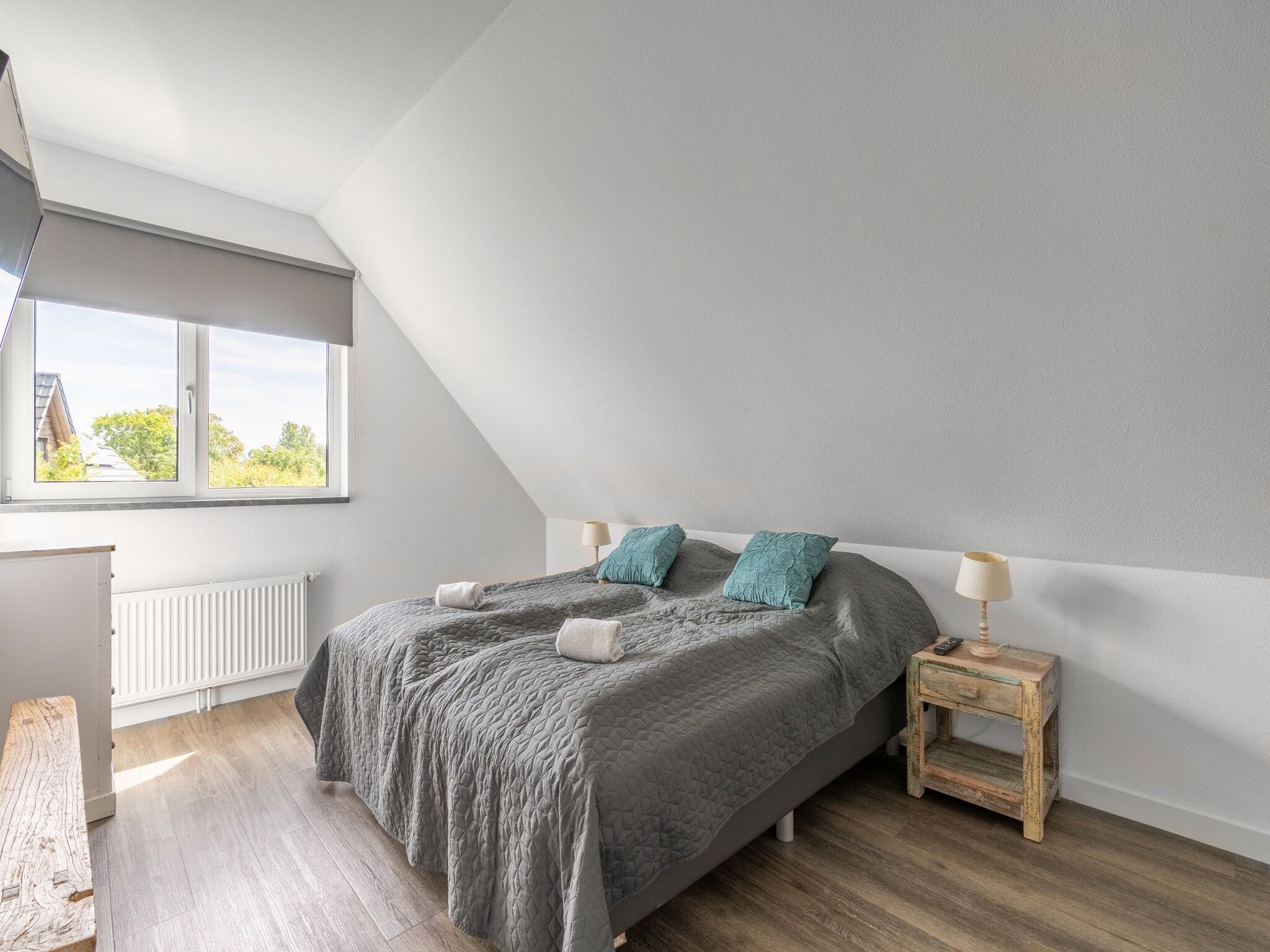 Een slaapkamer van Hoogelandt 106F in De Koog