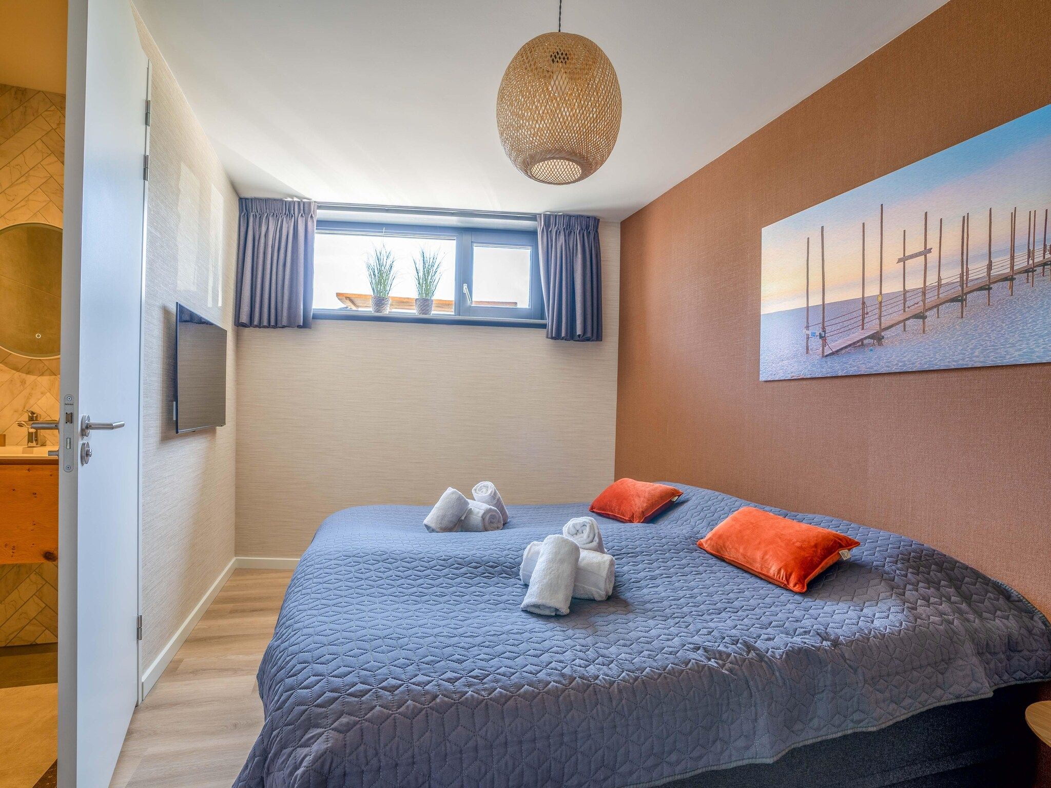 Een slaapkamer van Waalburght 24 in De Waal