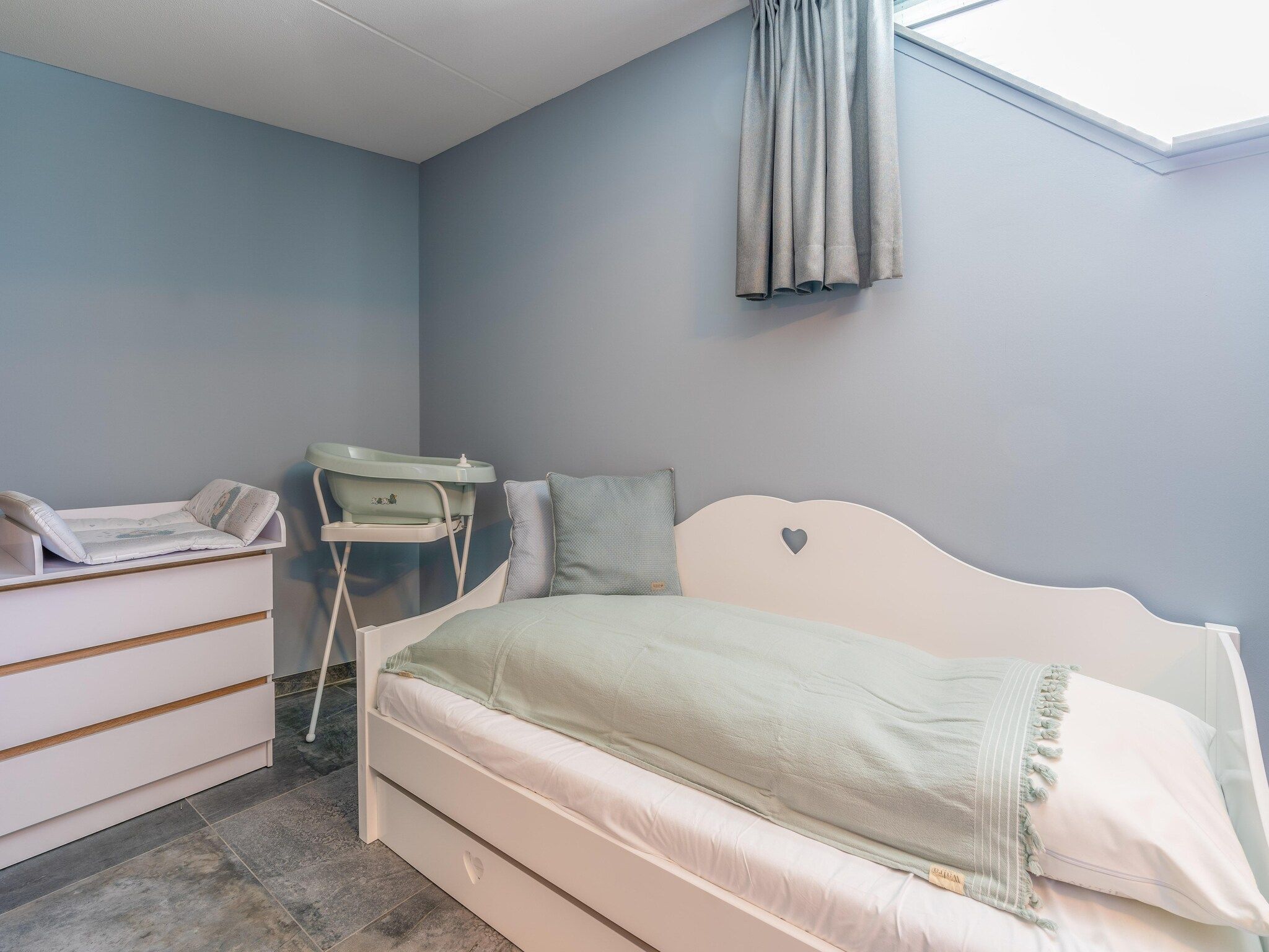 Een slaapkamer van Waalerburght 18 in De Waal