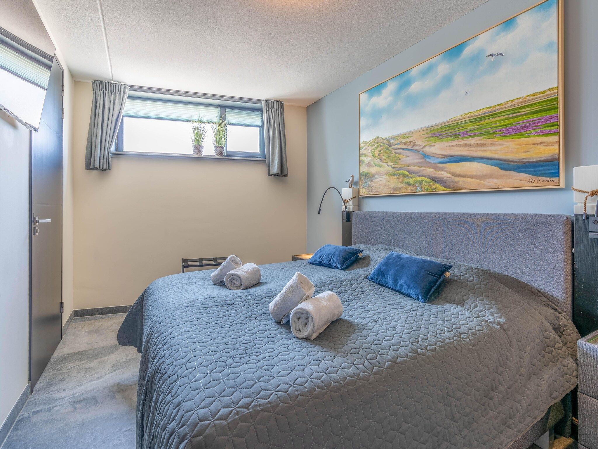 Een slaapkamer van Waalerburght 18 in De Waal