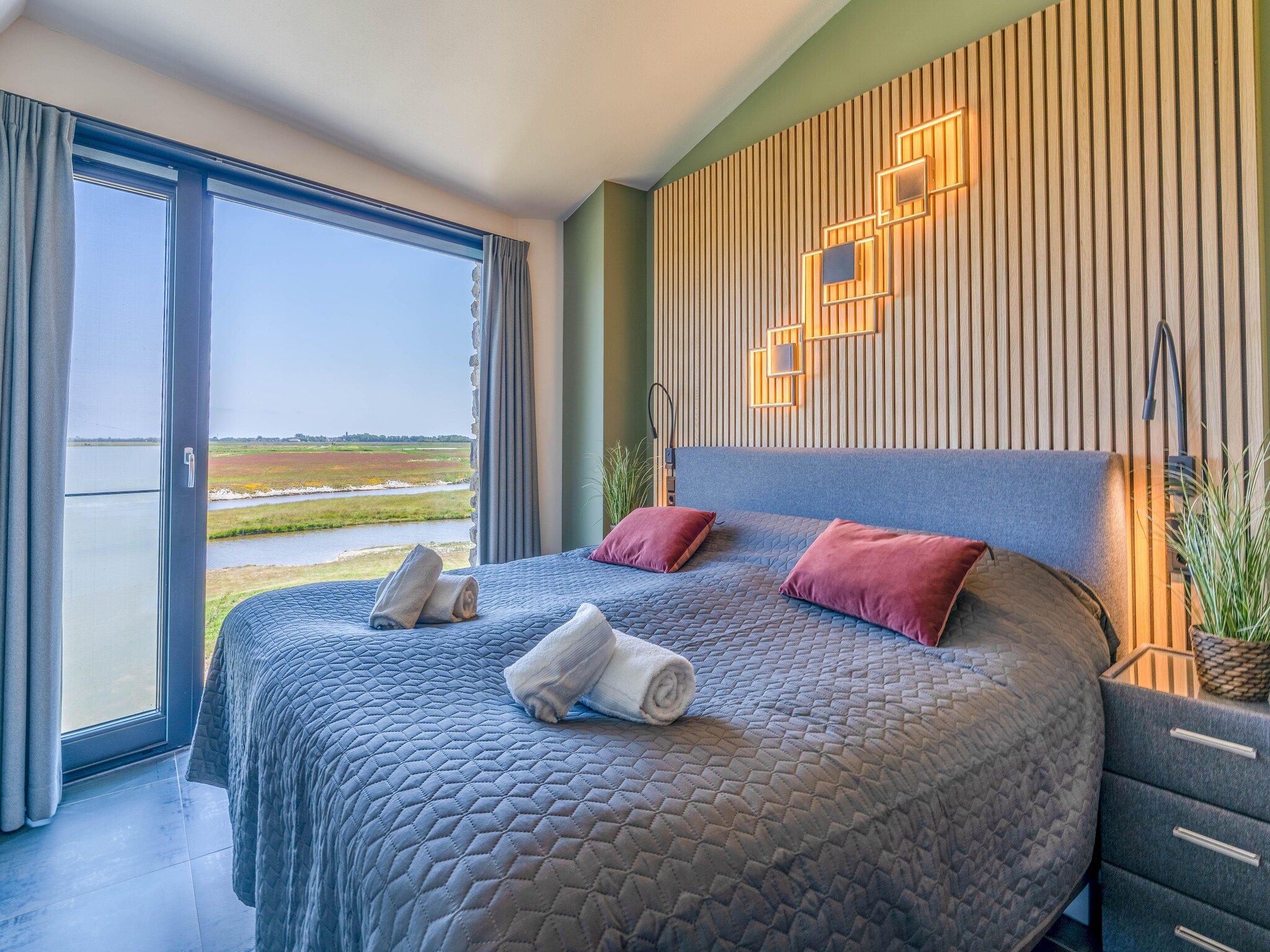 Een slaapkamer van Waalerburght 18 in De Waal