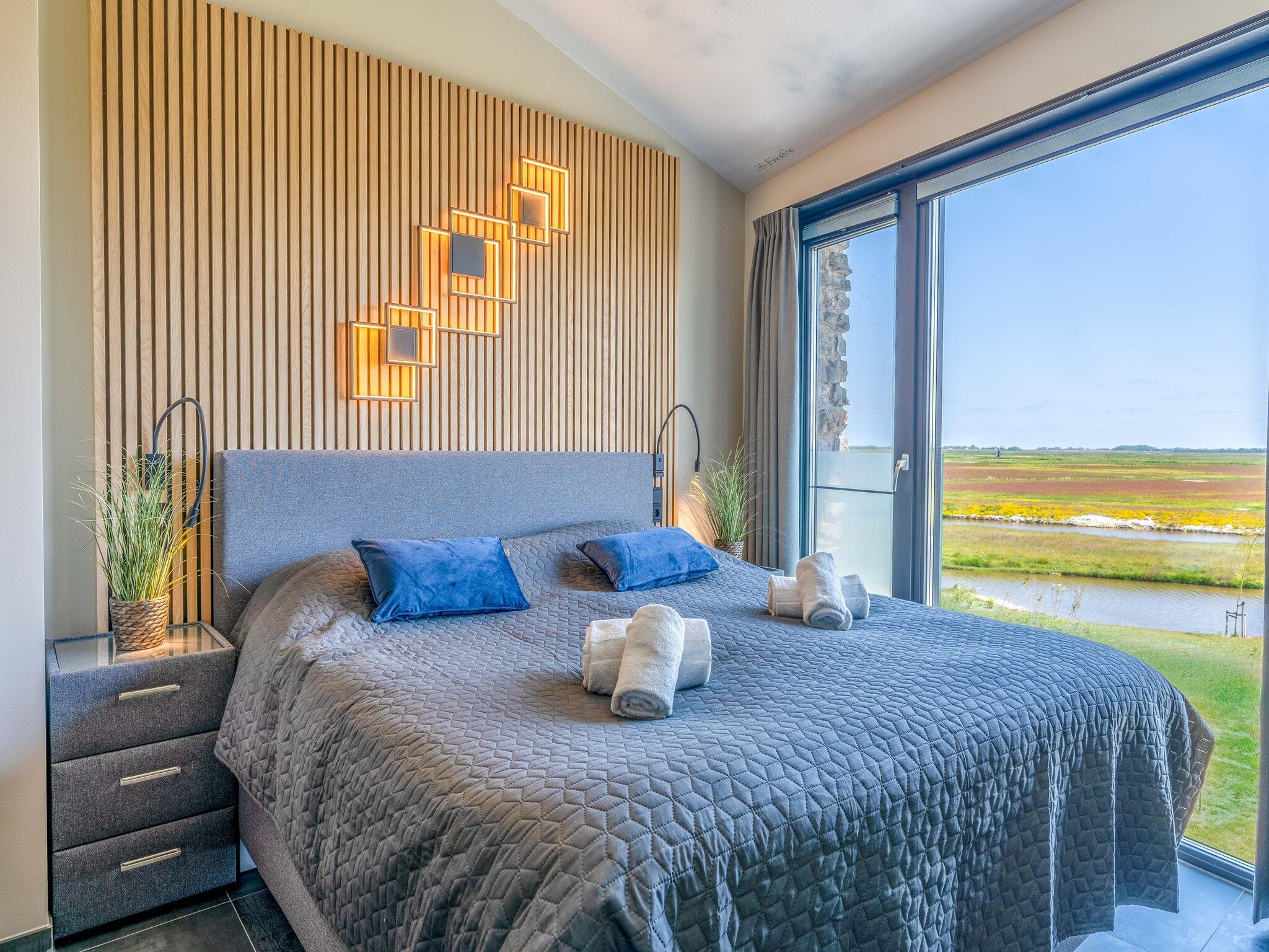 Een slaapkamer van Waalerburght 18 in De Waal