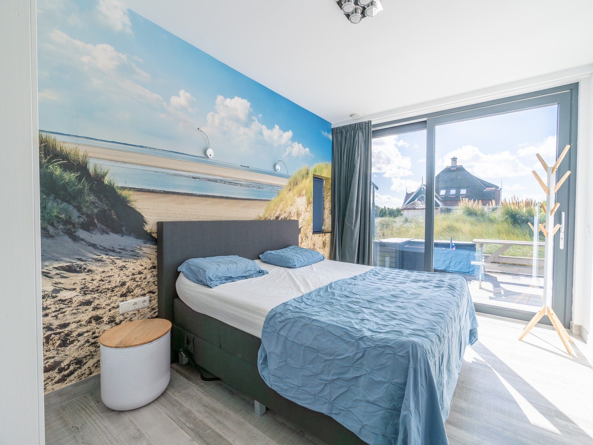 Een slaapkamer van Strandvilla Hygge in Den Burg