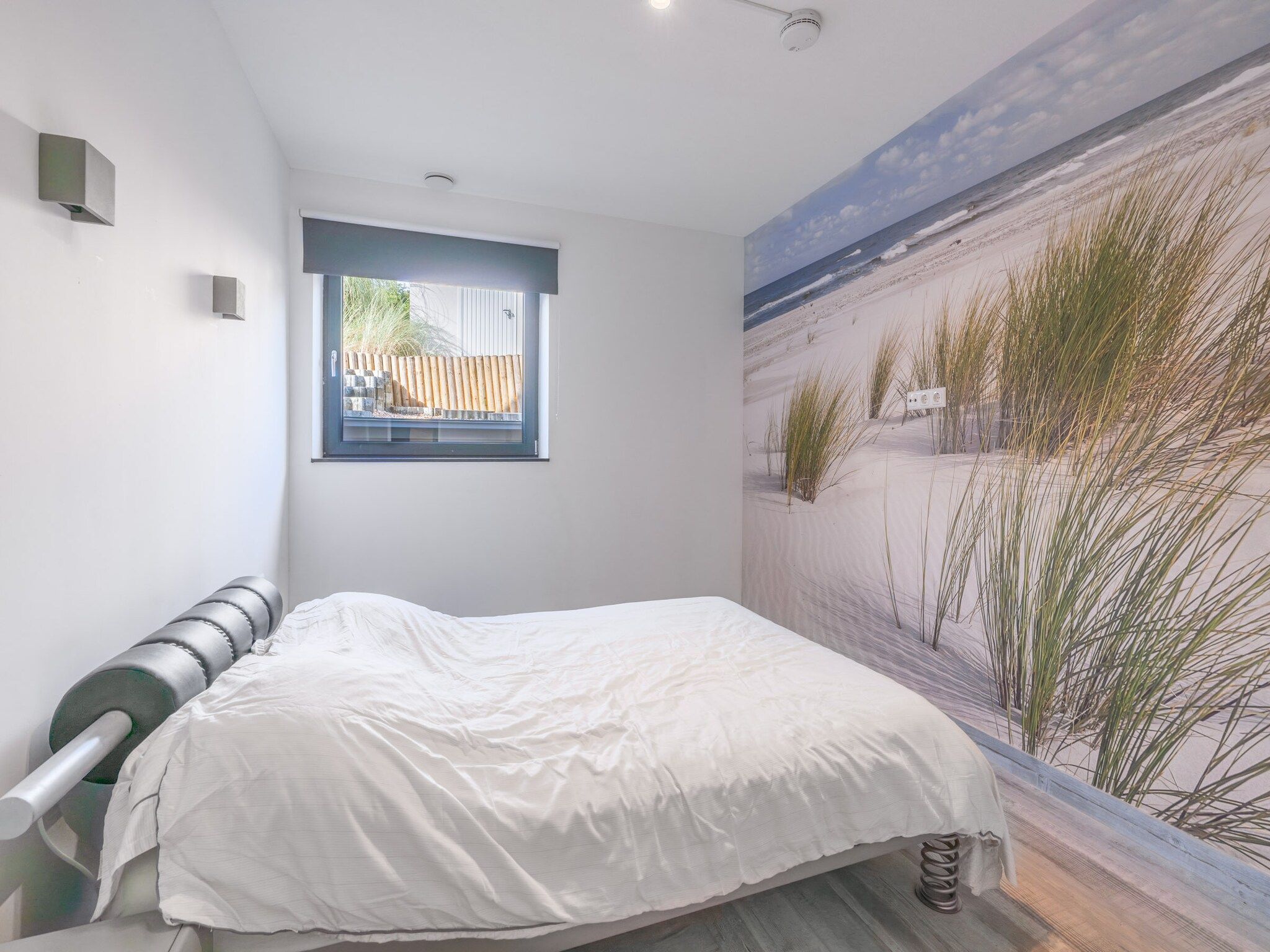 Een slaapkamer van Strandvilla Hygge in Den Burg