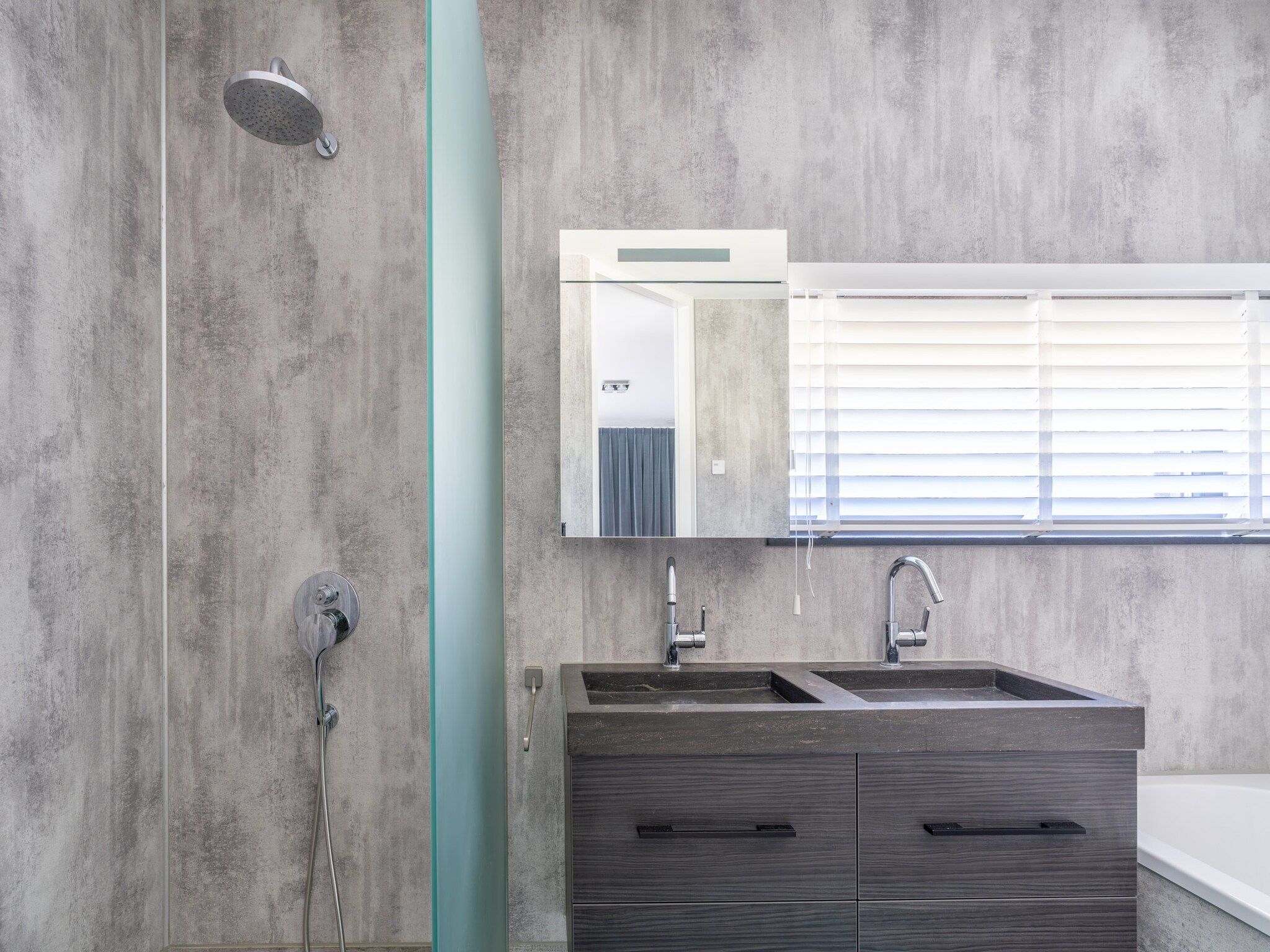 De badkamer van Strandvilla Hygge in Den Burg