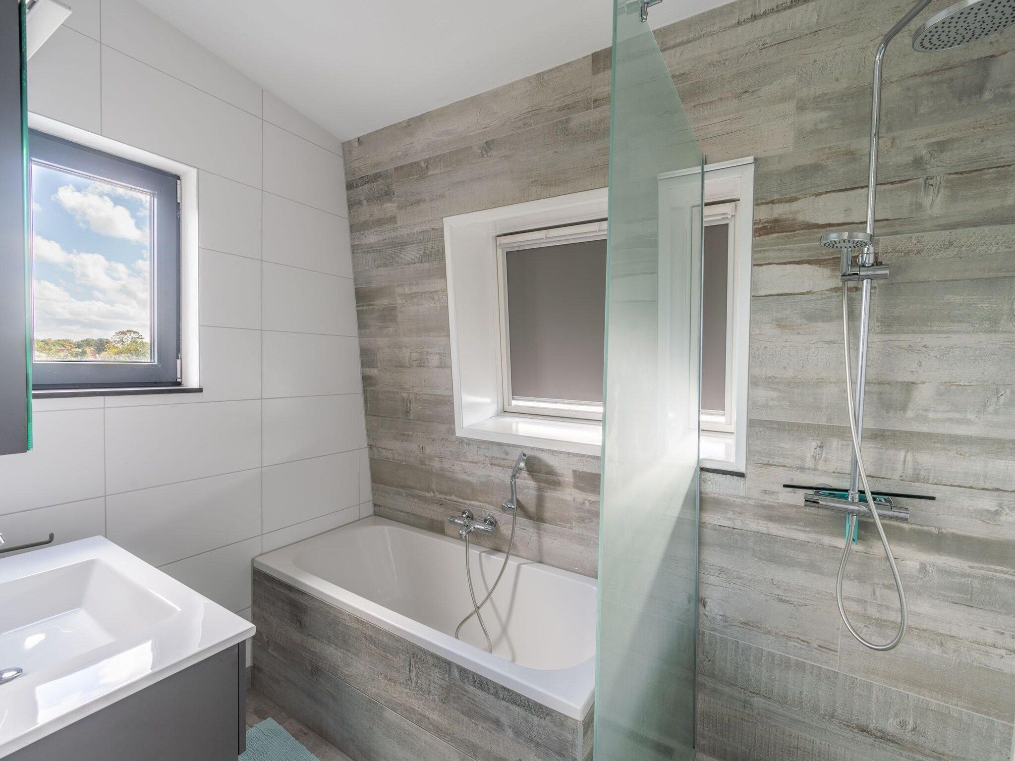 De badkamer van Strandvilla Hygge in Den Burg