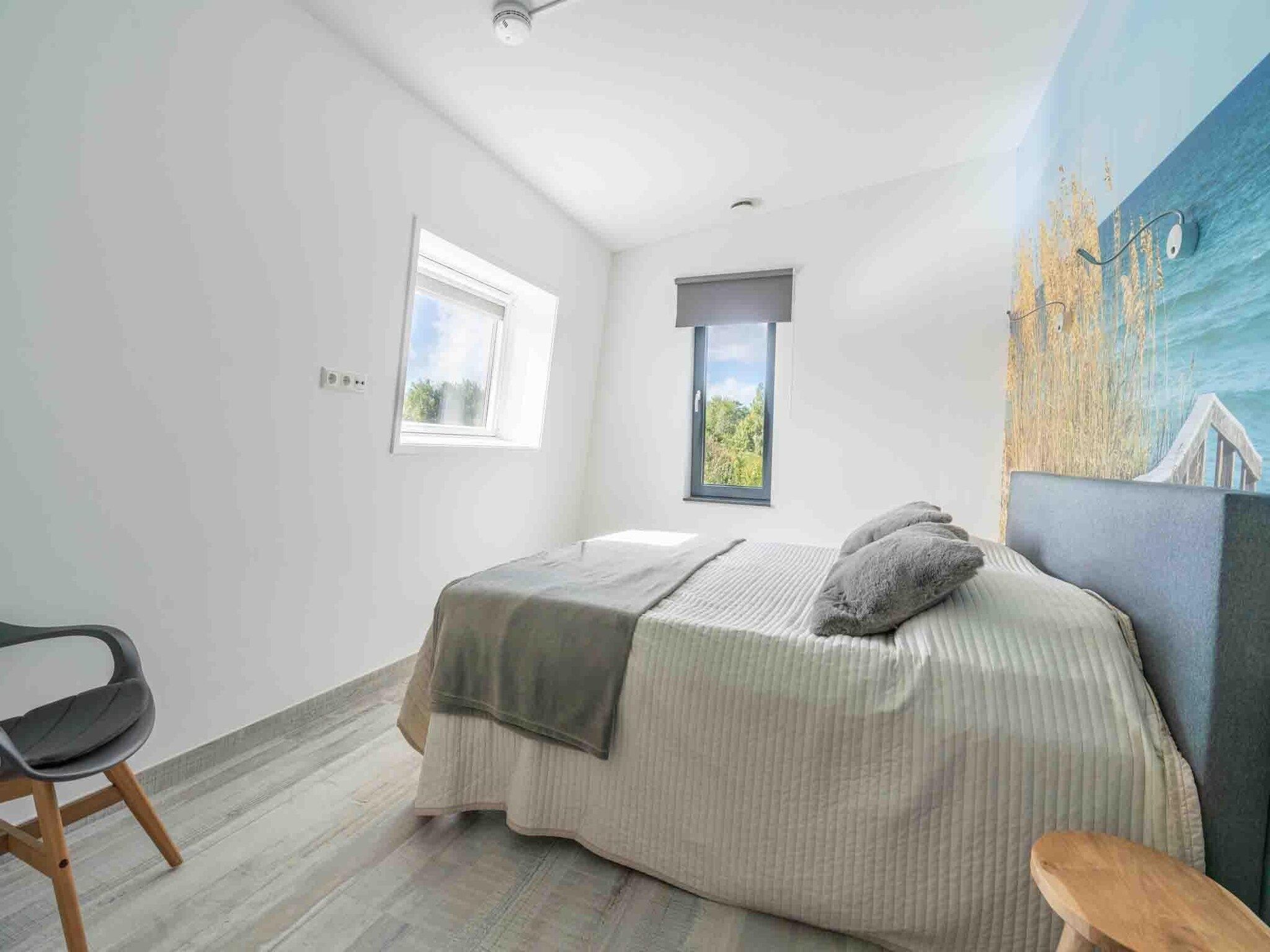Een slaapkamer van Strandvilla Hygge in Den Burg