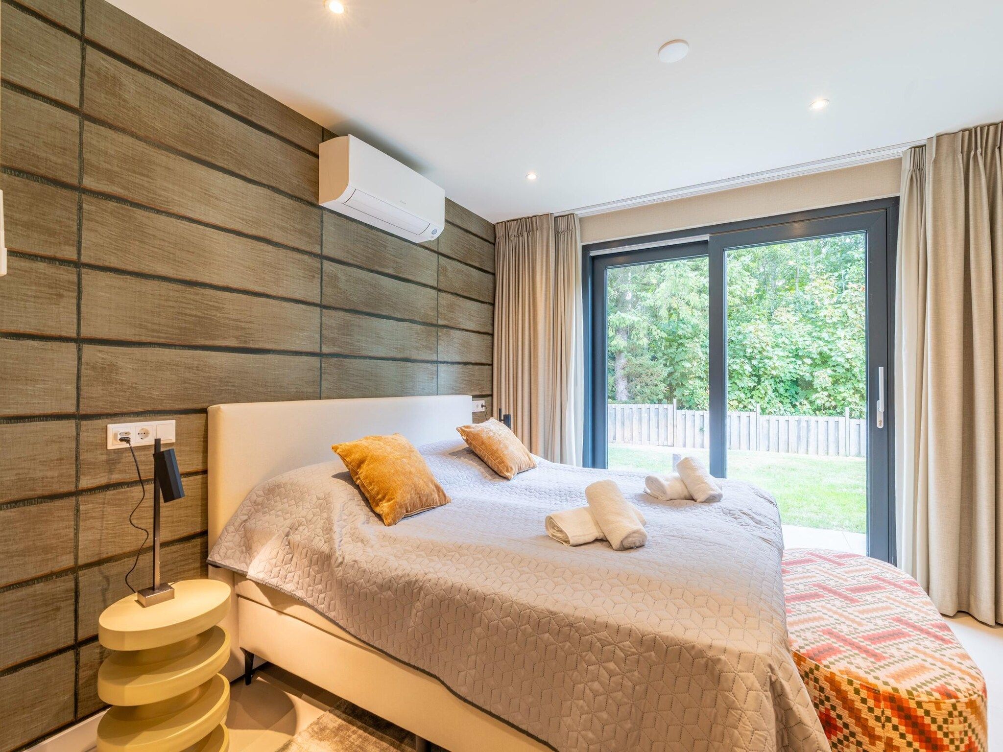 Een slaapkamer van Orchismient 39 in De Koog