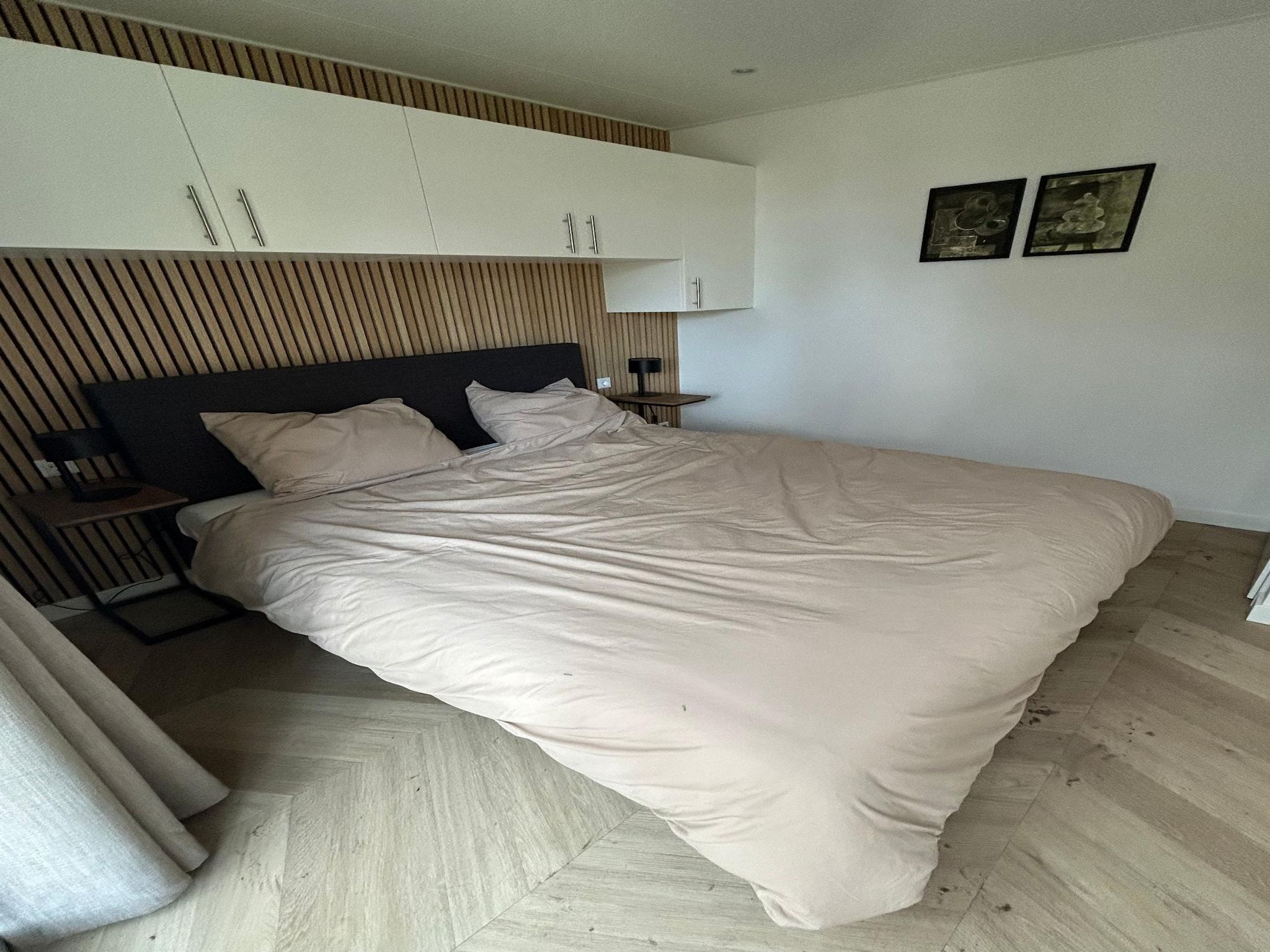 Een slaapkamer van De Steppe 8 pax - 7 in Ulicoten