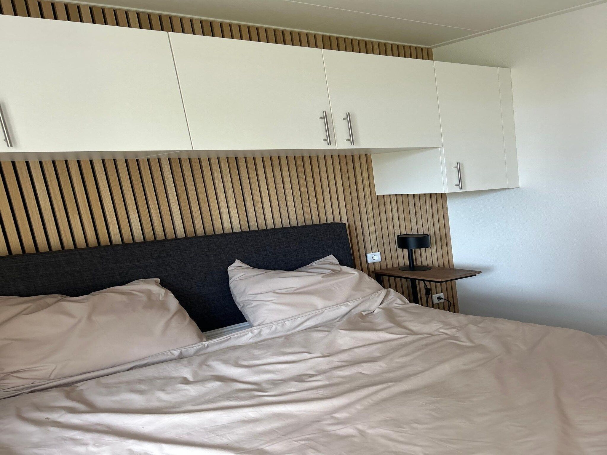 Een slaapkamer van De Steppe 8 pax - 13 in Ulicoten