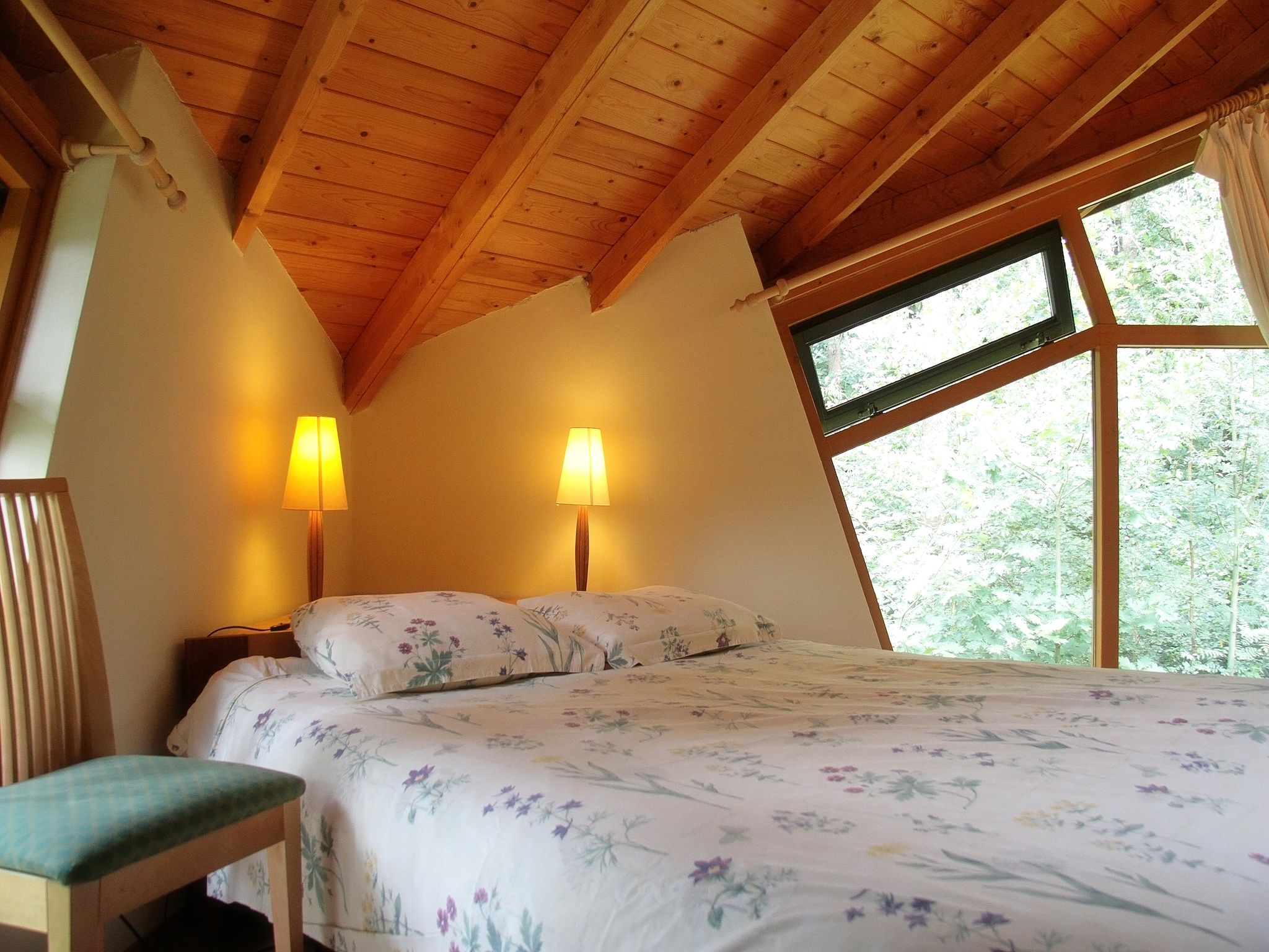 Een slaapkamer van Vakantiepark Herperduin 6 in Herpen