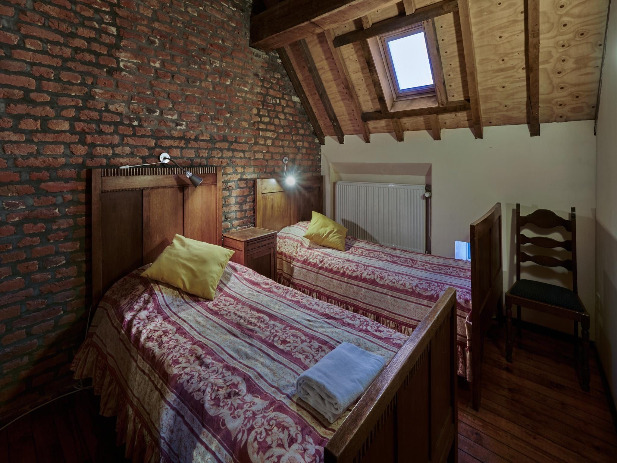 Een slaapkamer van Meschermolen 3 in Mesch-Eijsden