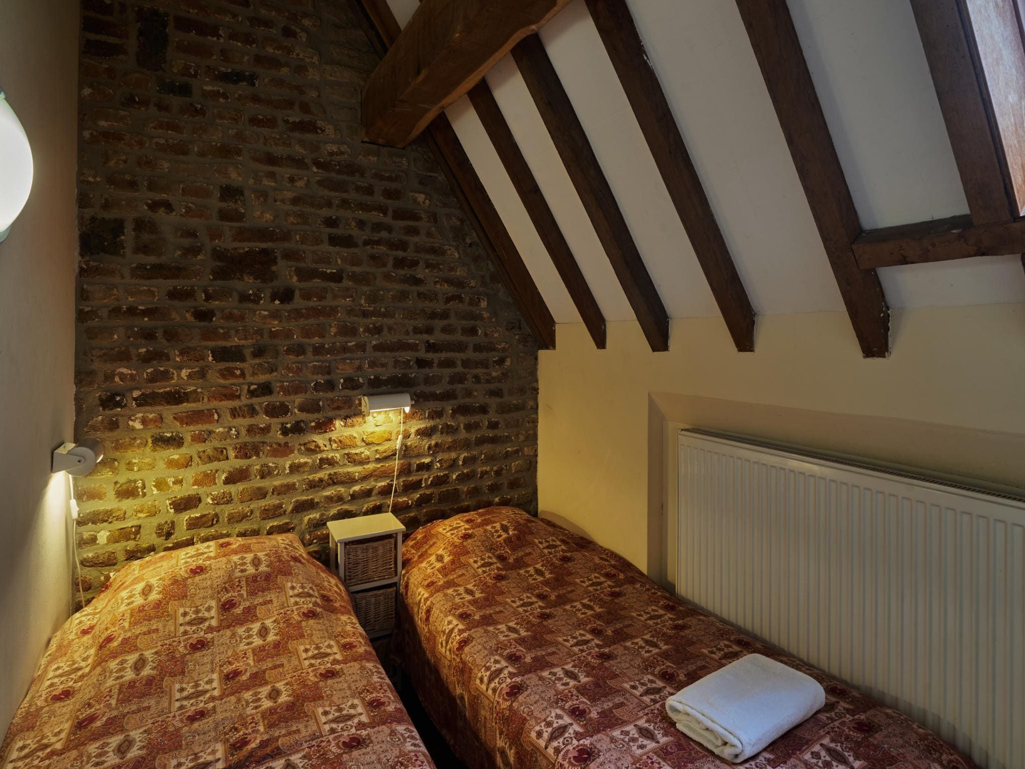 Een slaapkamer van Meschermolen 13 in Mesch-Eijsden