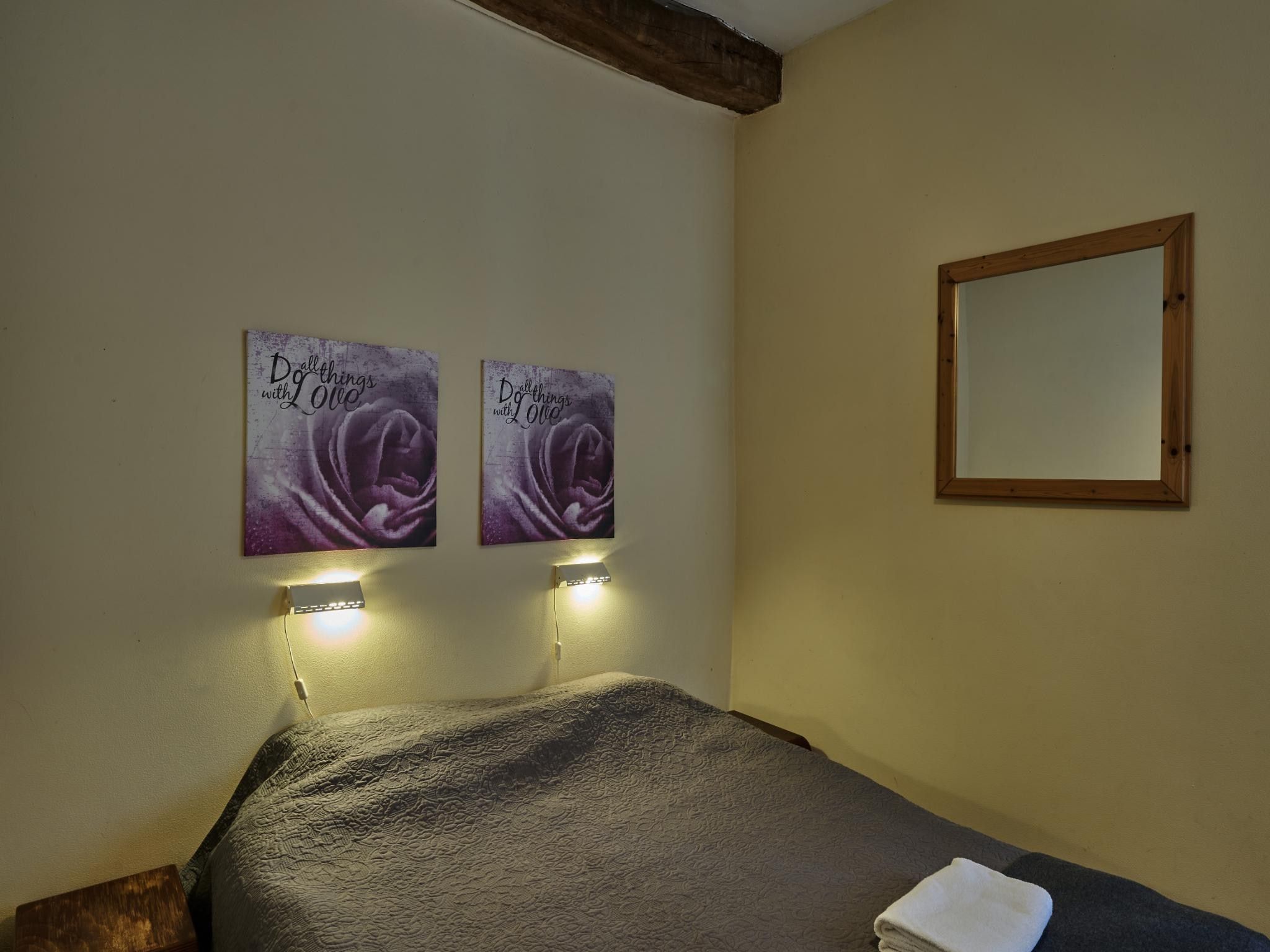 Een slaapkamer van Meschermolen 13 in Mesch-Eijsden