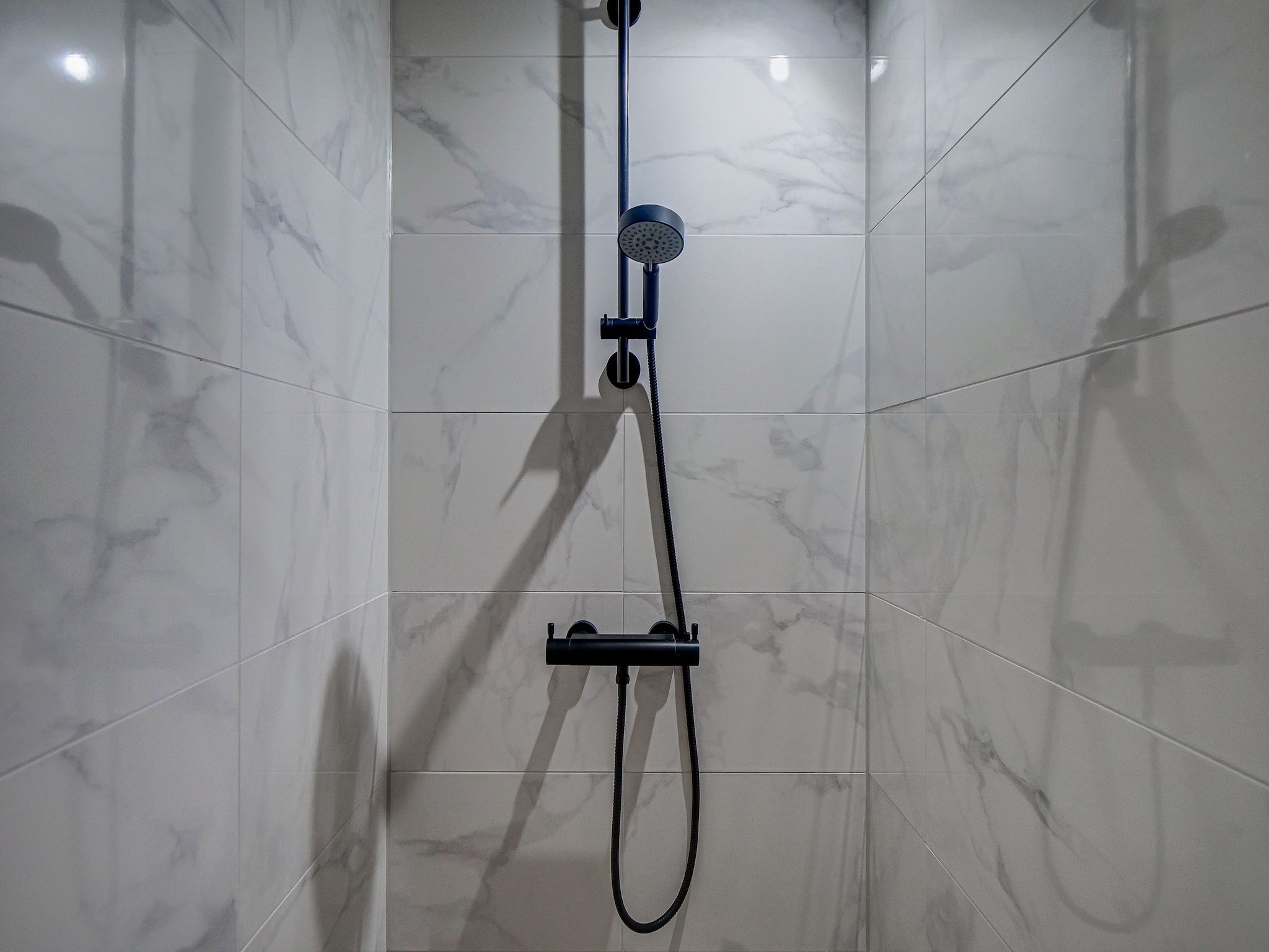 De badkamer van Familiehuis Zee & Zand in Julianadorp