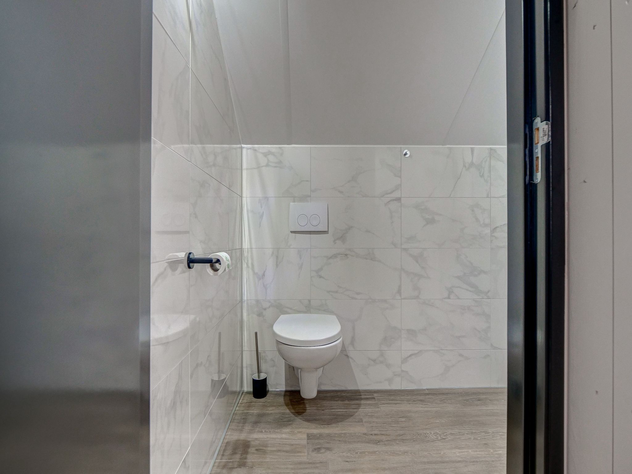 De badkamer van Familiehuis Zee & Zand in Julianadorp