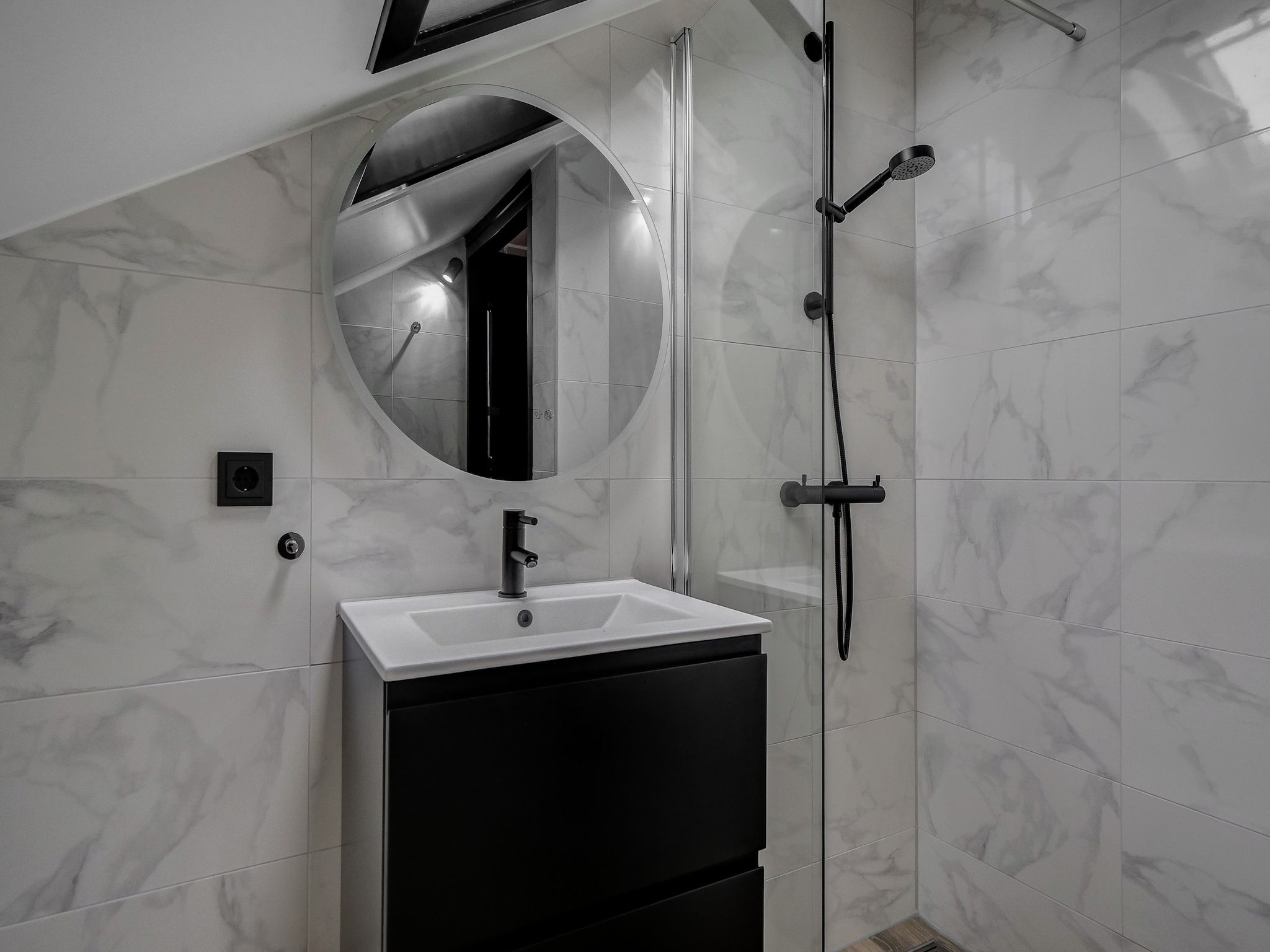 De badkamer van Familiehuis Zee & Zand in Julianadorp