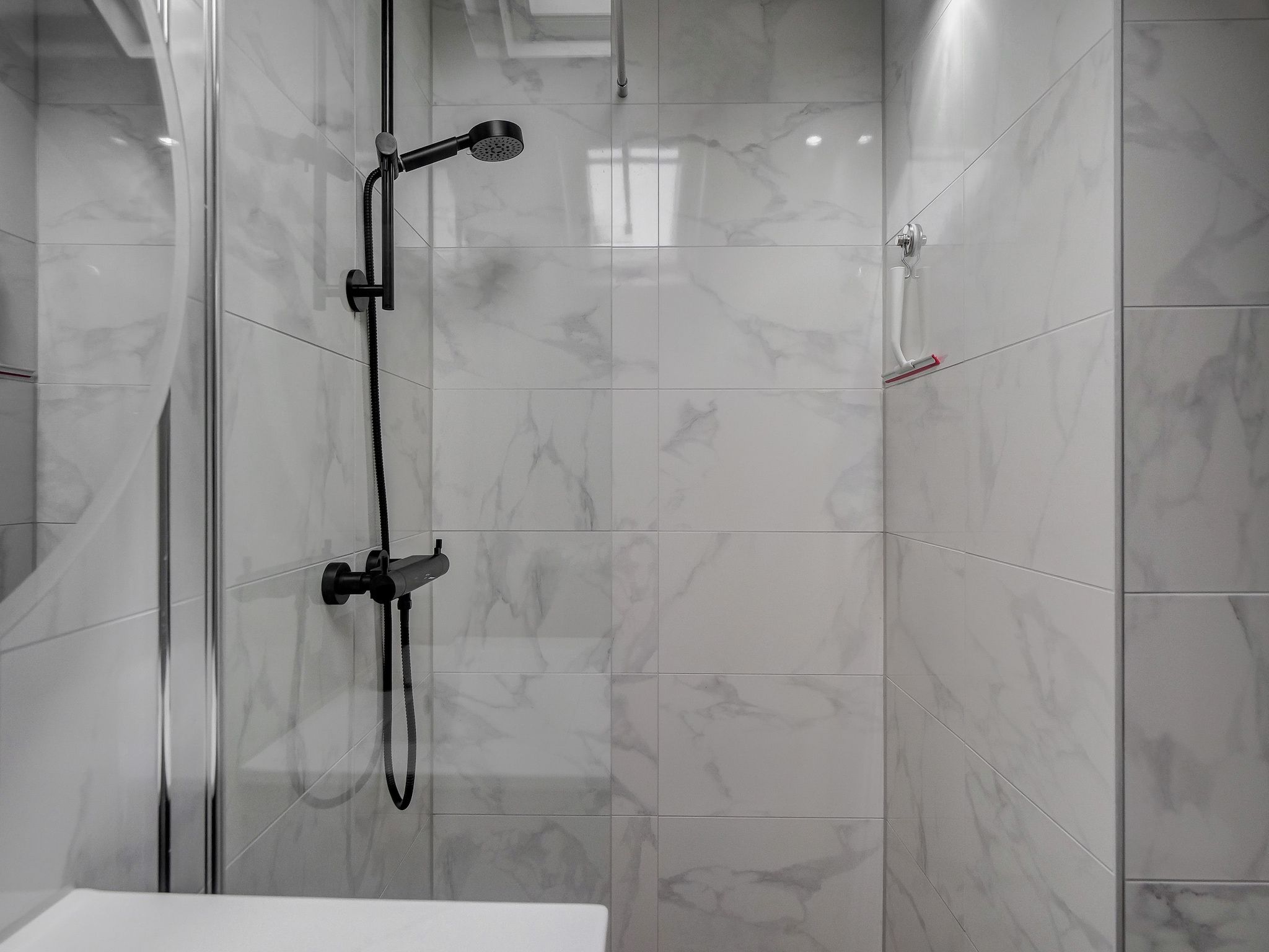 De badkamer van Familiehuis Zee & Zand in Julianadorp