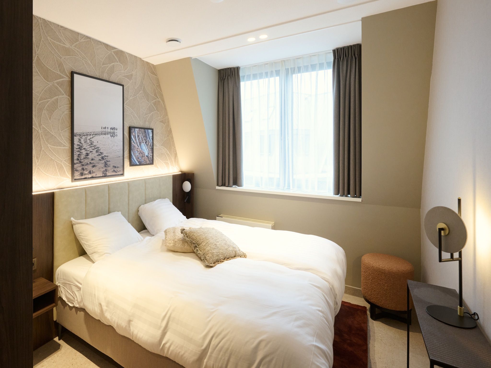 Een slaapkamer van Droomsuites Texel - 8 person apartement in Den Burg