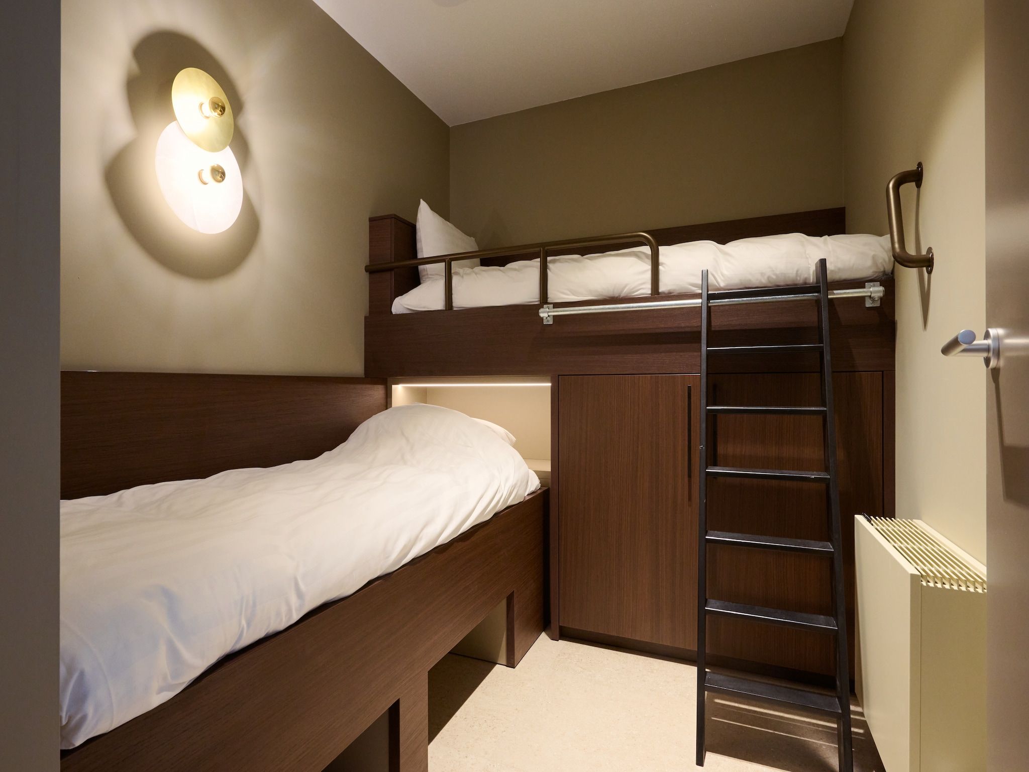 Een slaapkamer van Droomsuites Texel - 8 person apartement in Den Burg