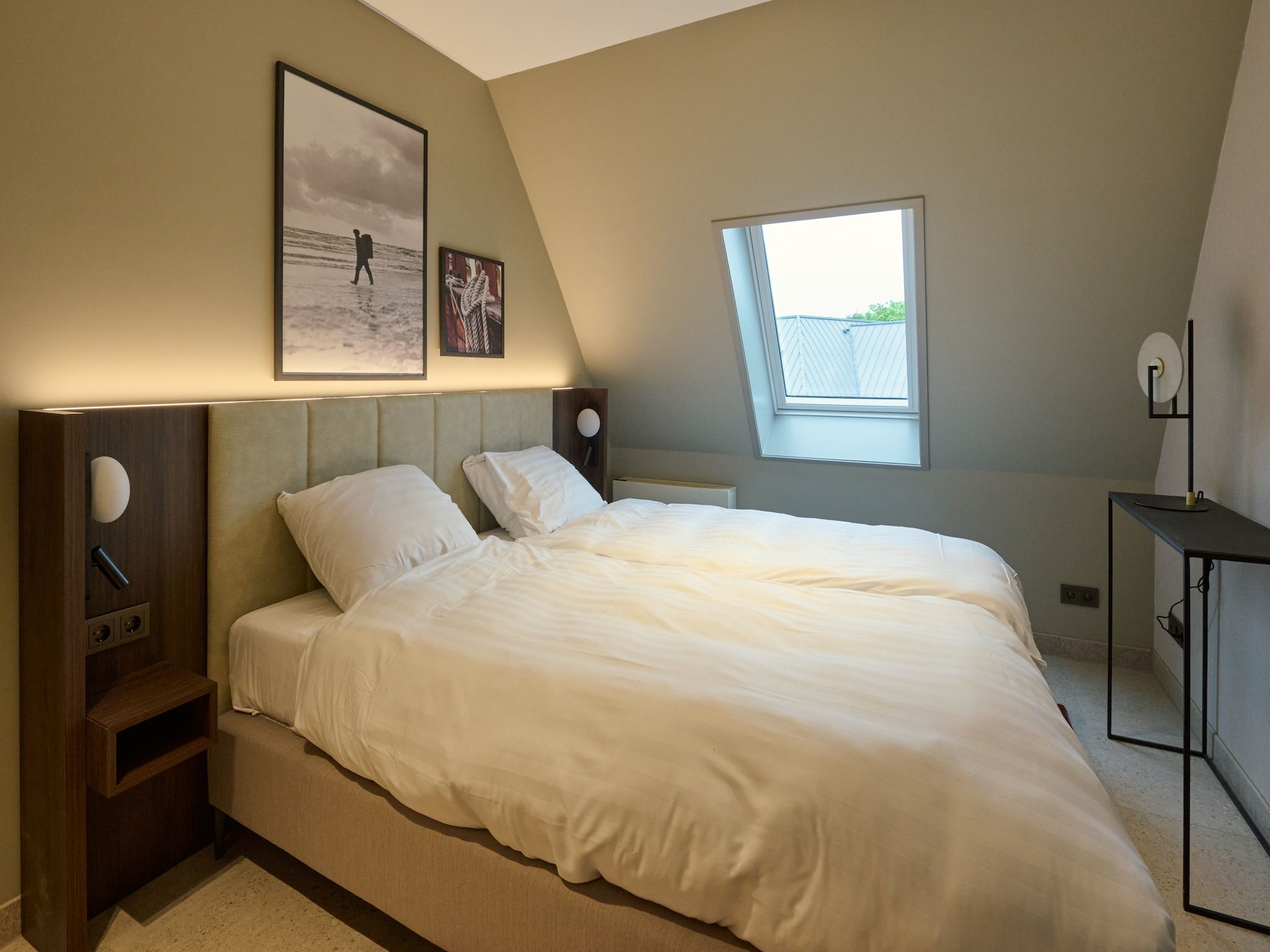 Een slaapkamer van Droomsuites Texel - 8 person apartement in Den Burg