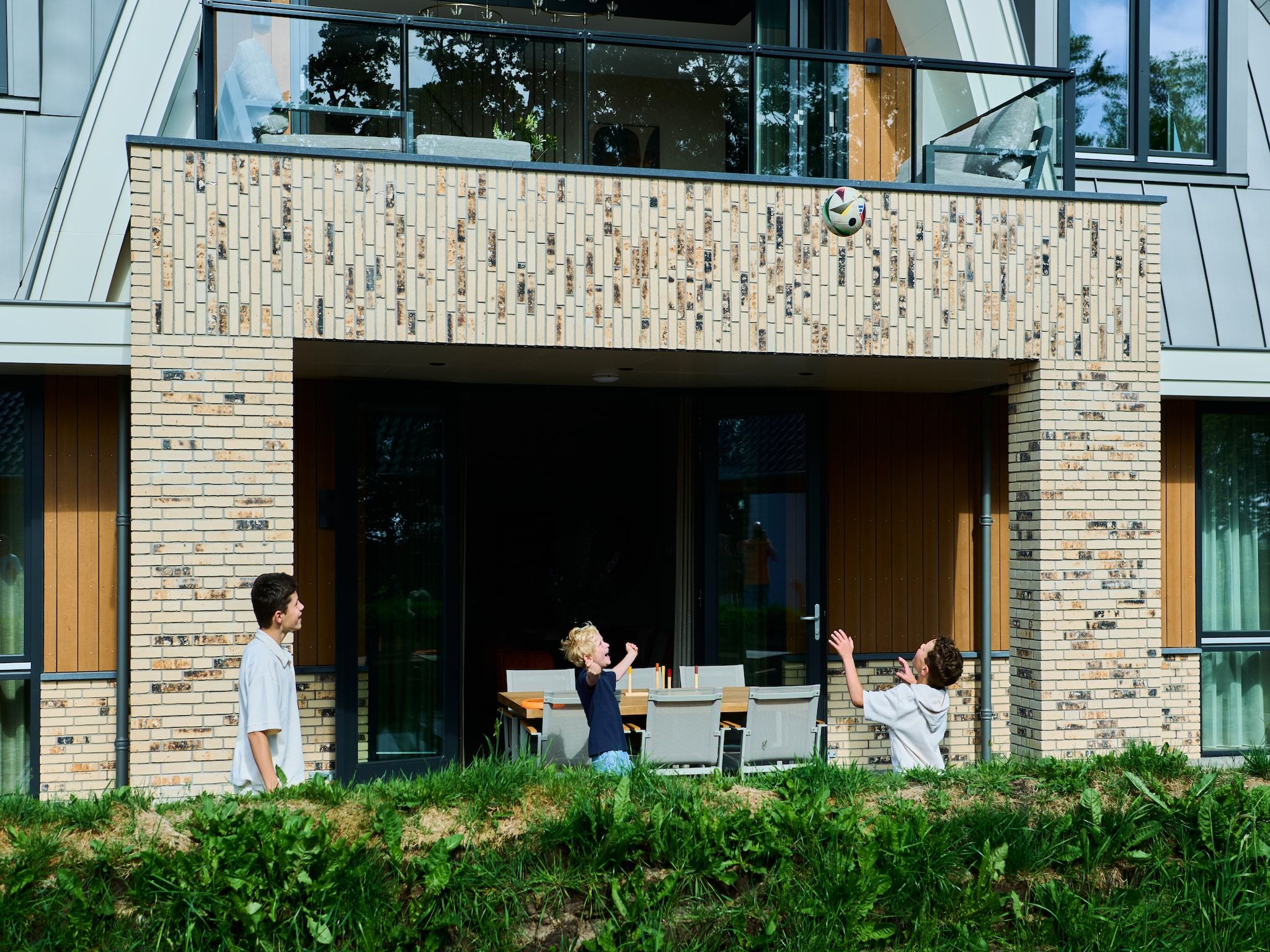 Het terras van Droomsuites Texel - 8 person apartement in Den Burg