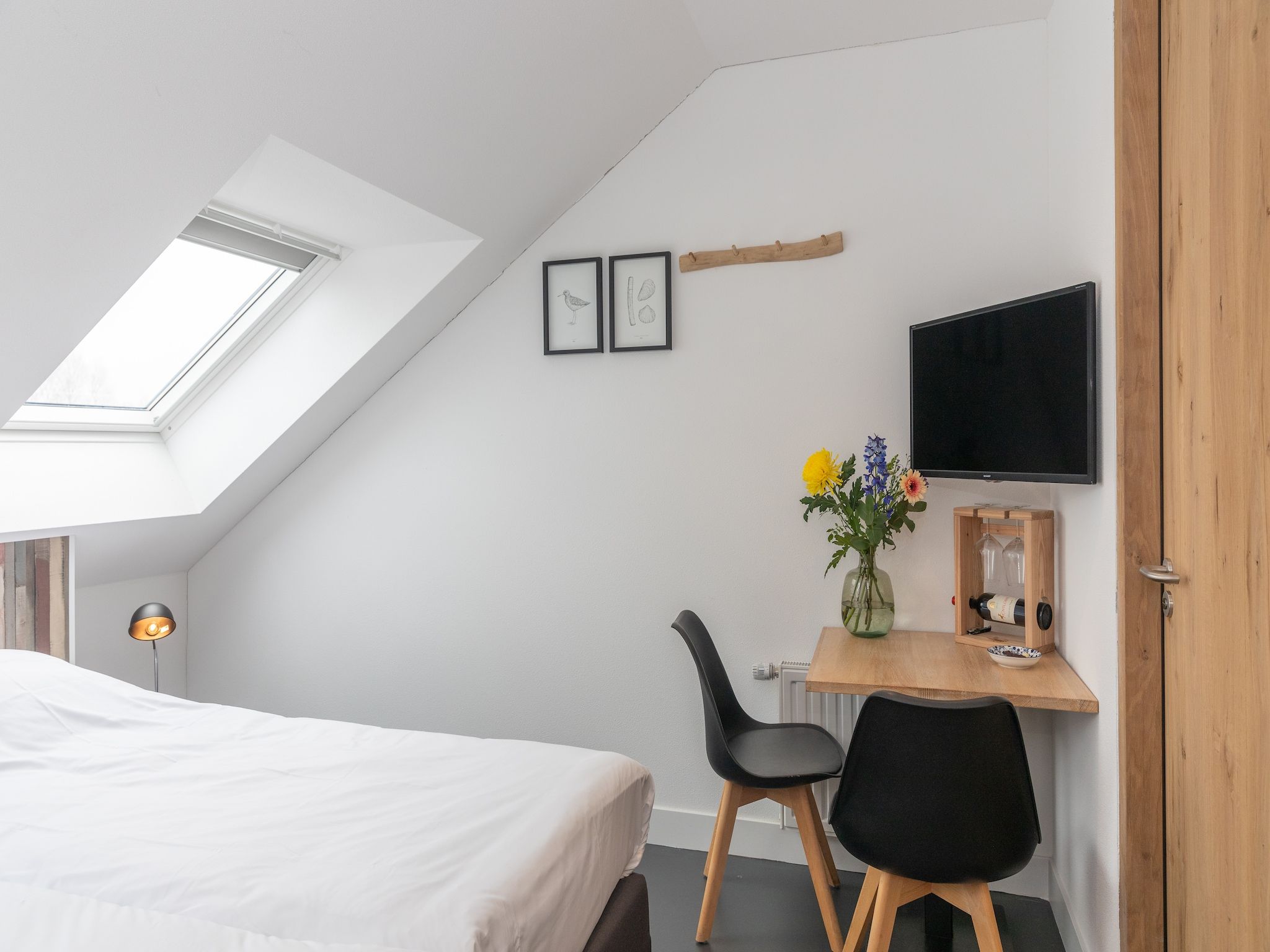 Een slaapkamer van Duynweelde Texel in Den Burg