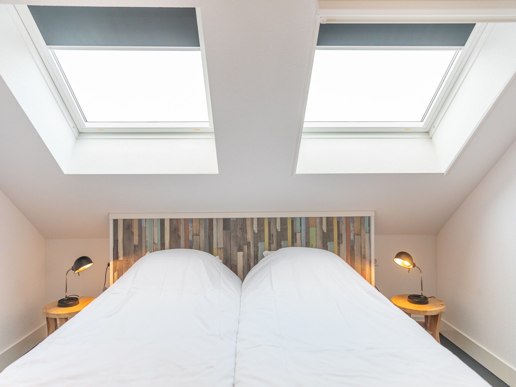 Een slaapkamer van Duynweelde Texel in Den Burg