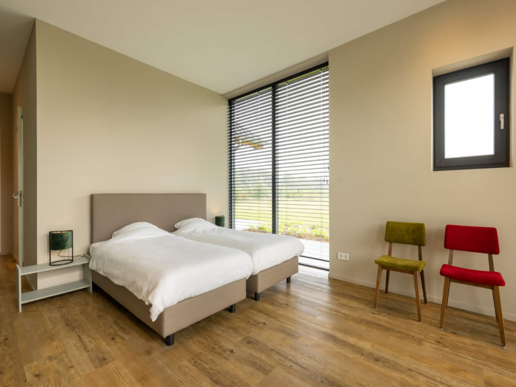 Een slaapkamer van Het Heerlijcke Huis in Aalten