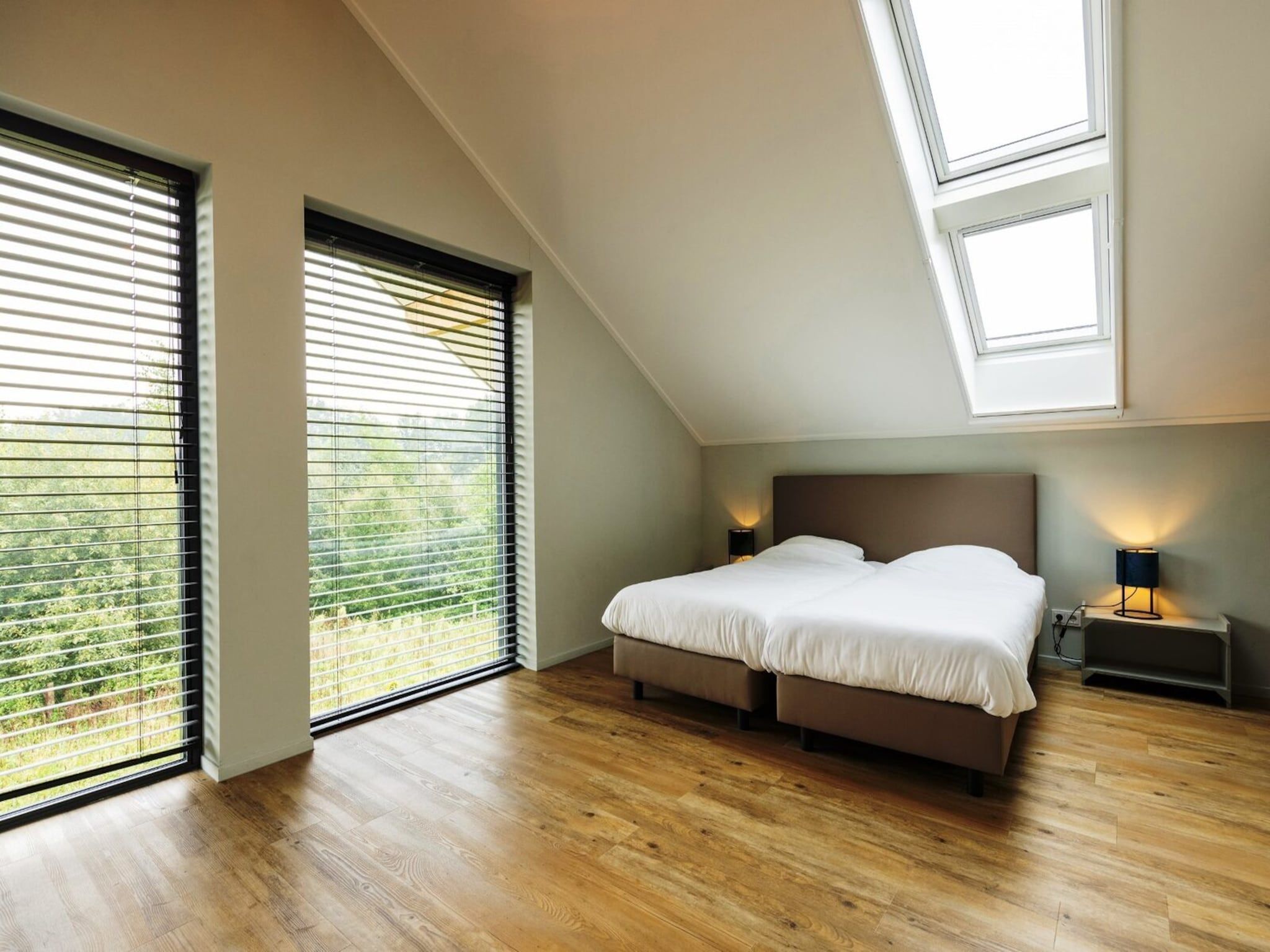 Een slaapkamer van Het Heerlijcke Huis in Aalten