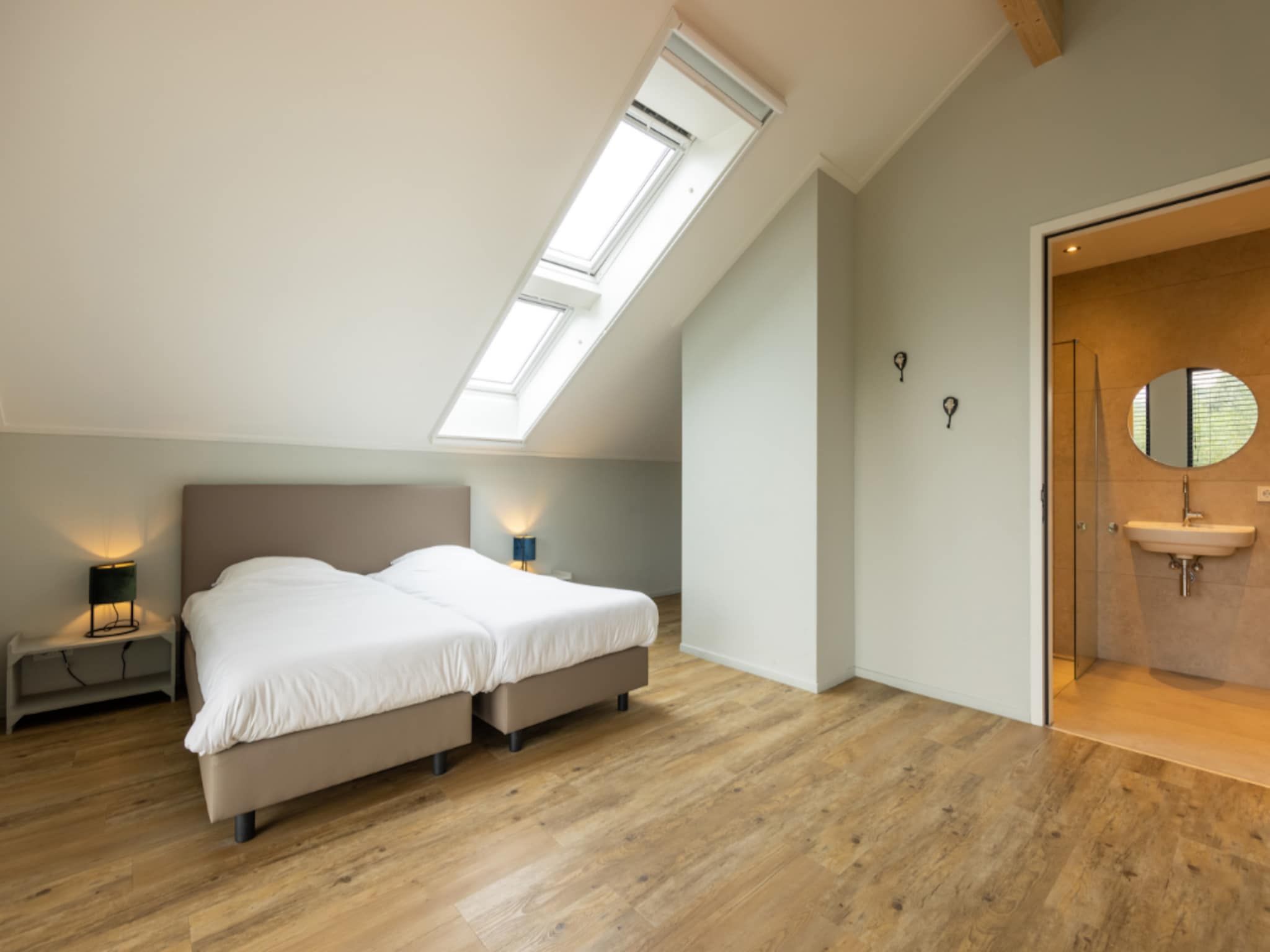 Een slaapkamer van Het Heerlijcke Huis in Aalten