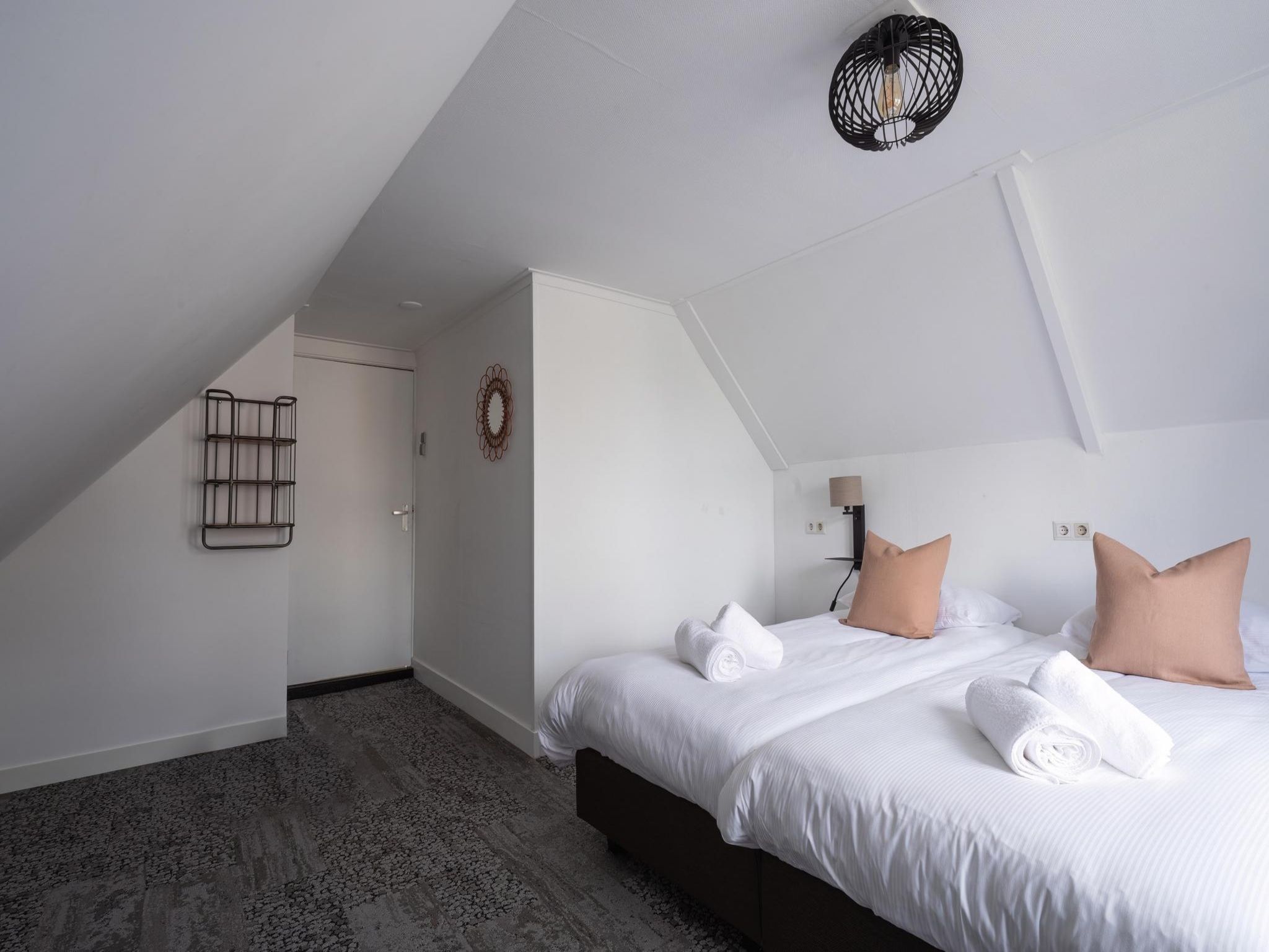 Een slaapkamer van Tussen Duin en Strand in Egmond aan den Hoef