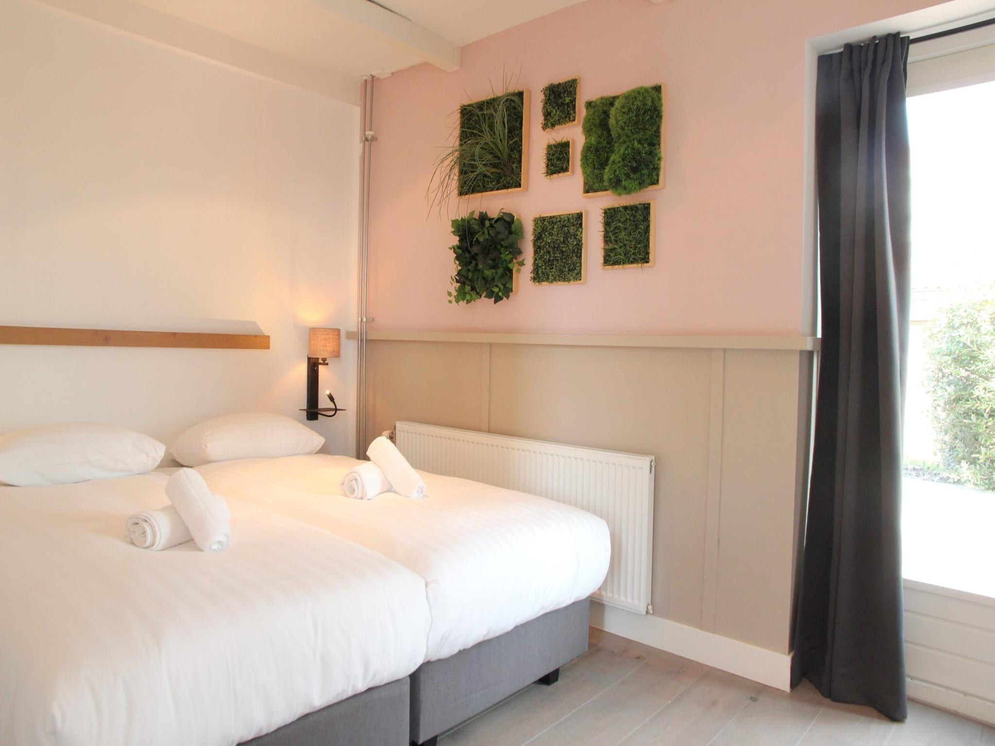 Een slaapkamer van Tussen Duin en Strand in Egmond aan den Hoef