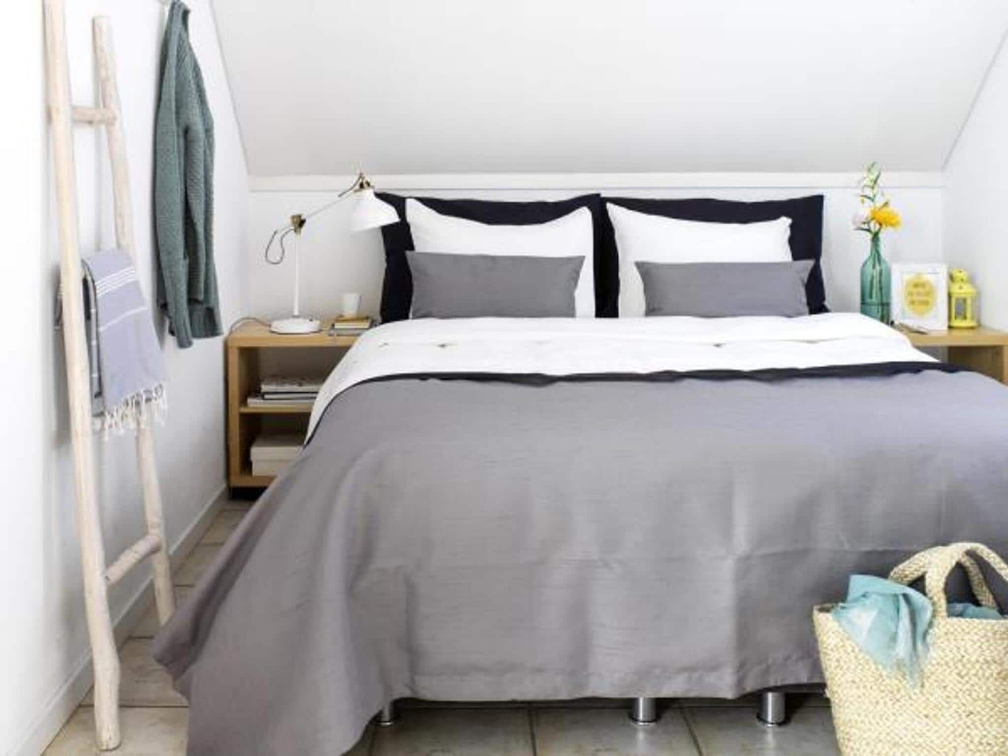 Een slaapkamer van Family House | 10-12 personen | 4 slaapkamers | 3,5 badkamers in Loosdrecht