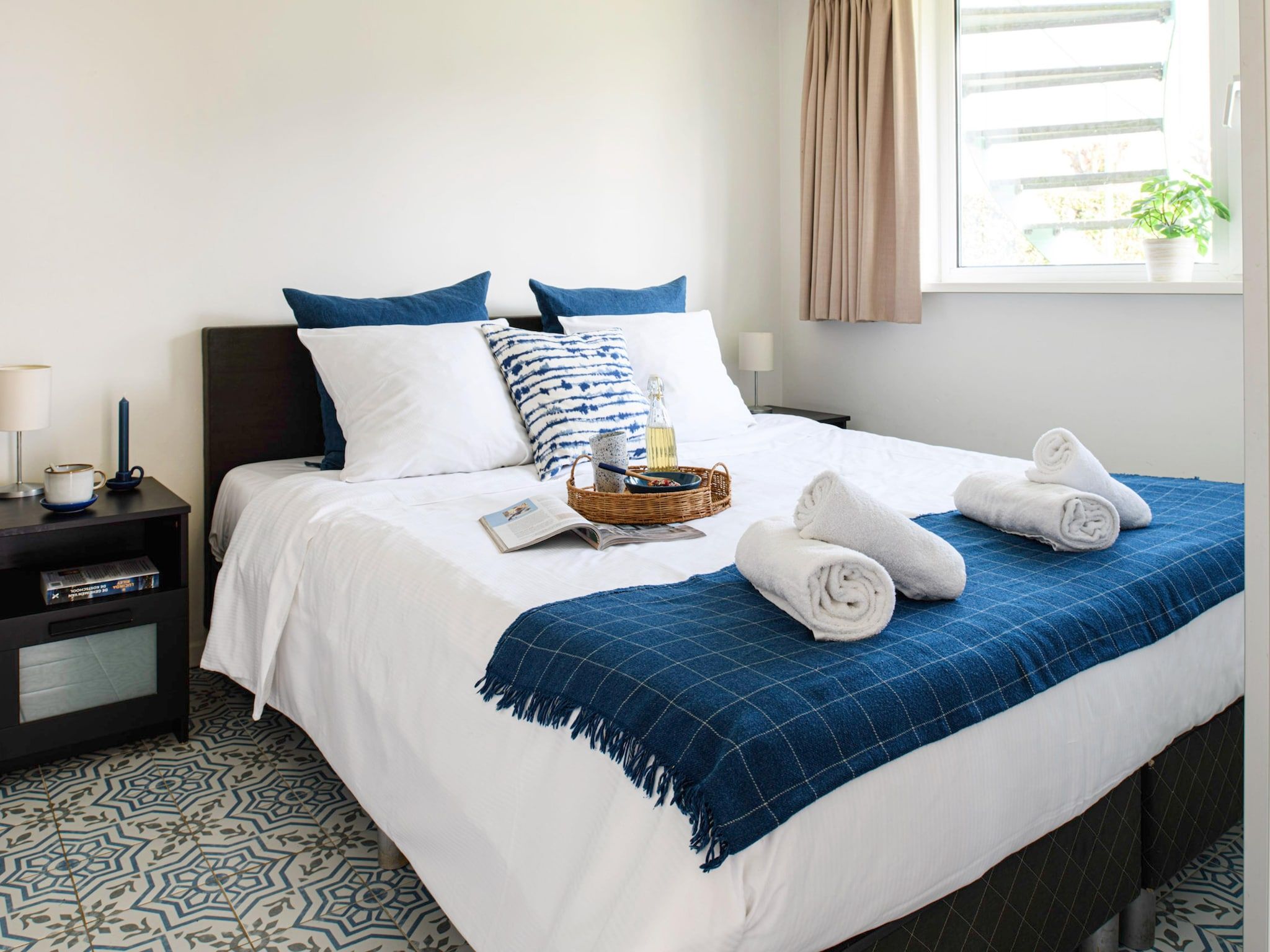 Een slaapkamer van Panorama Villa | 3-8 pers | 3 slaapkamers | 2,5 badkamers in Loosdrecht