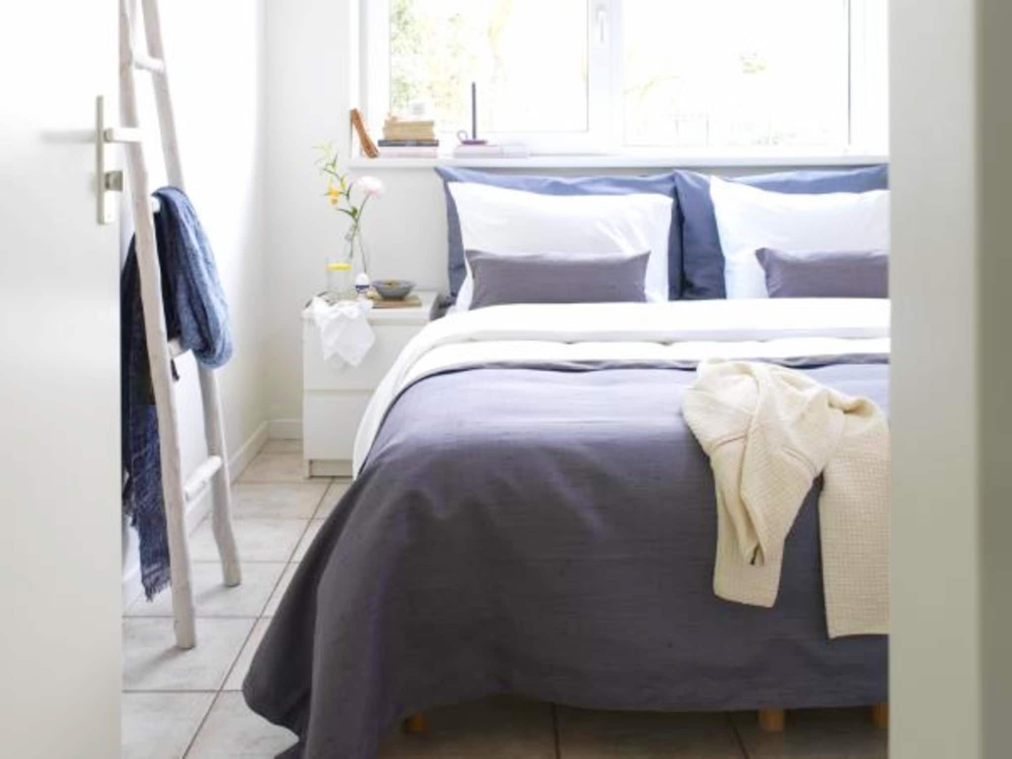 Een slaapkamer van Panorama Villa | 3-8 pers | 3 slaapkamers | 2,5 badkamers in Loosdrecht