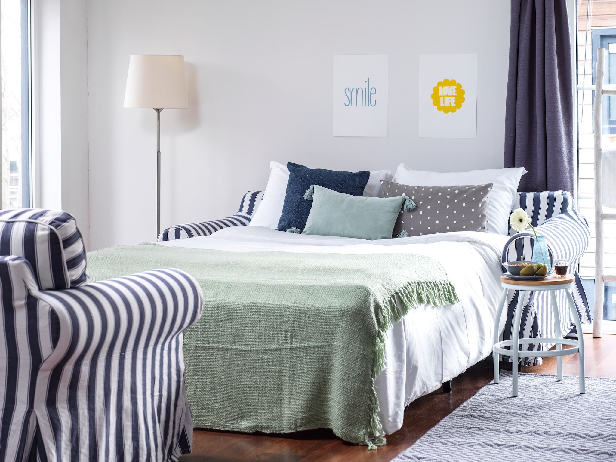 Een slaapkamer van Watervilla in Loosdrecht