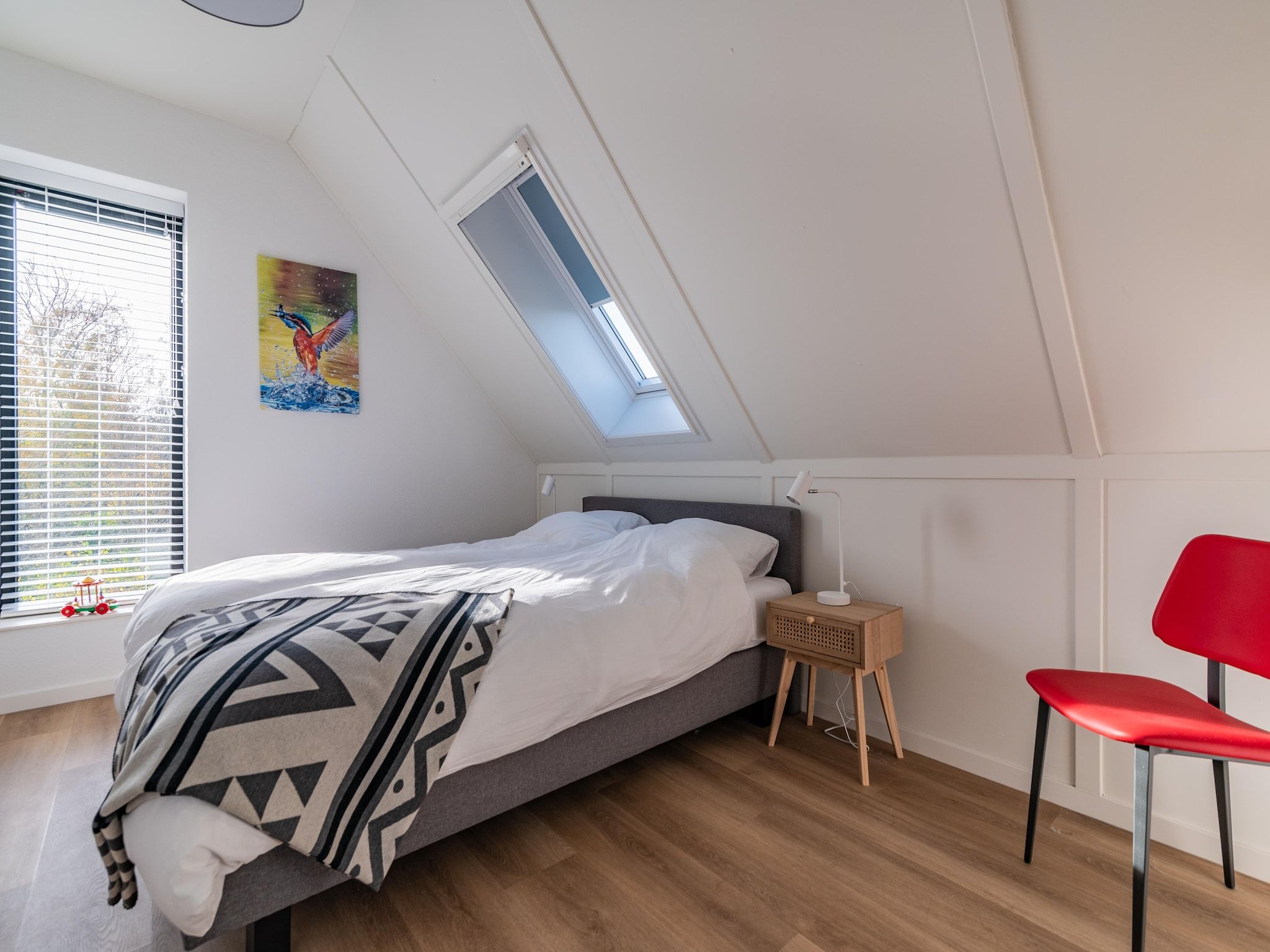 Een slaapkamer van Meer van Eysinga in Sint Nicolaasga
